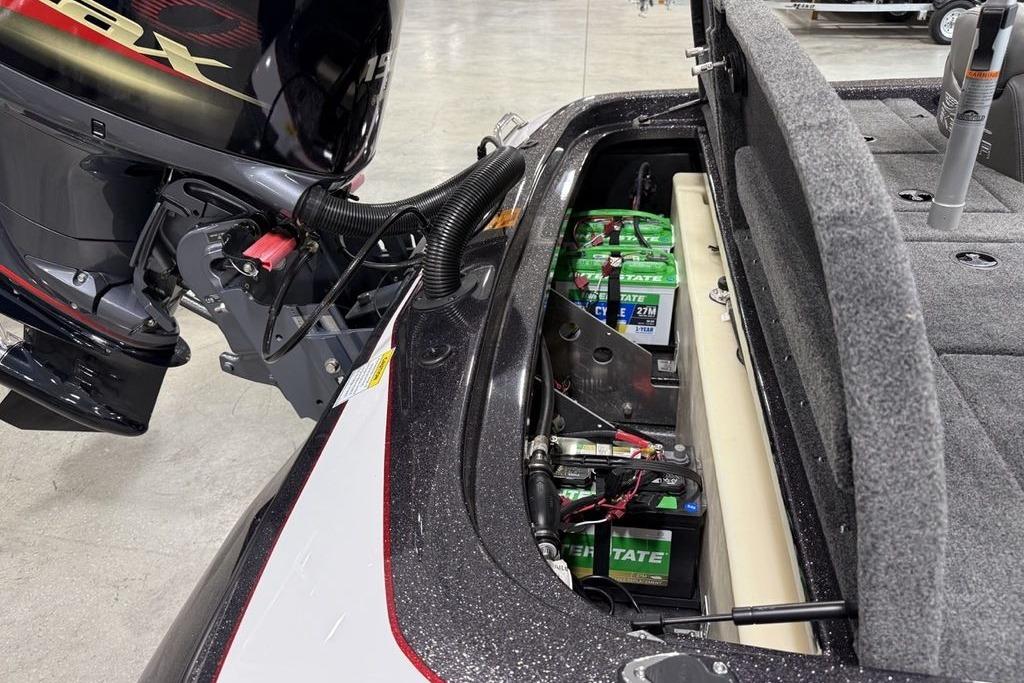 2025 Skeeter ZX150 boat showing engine and battery compartment details.