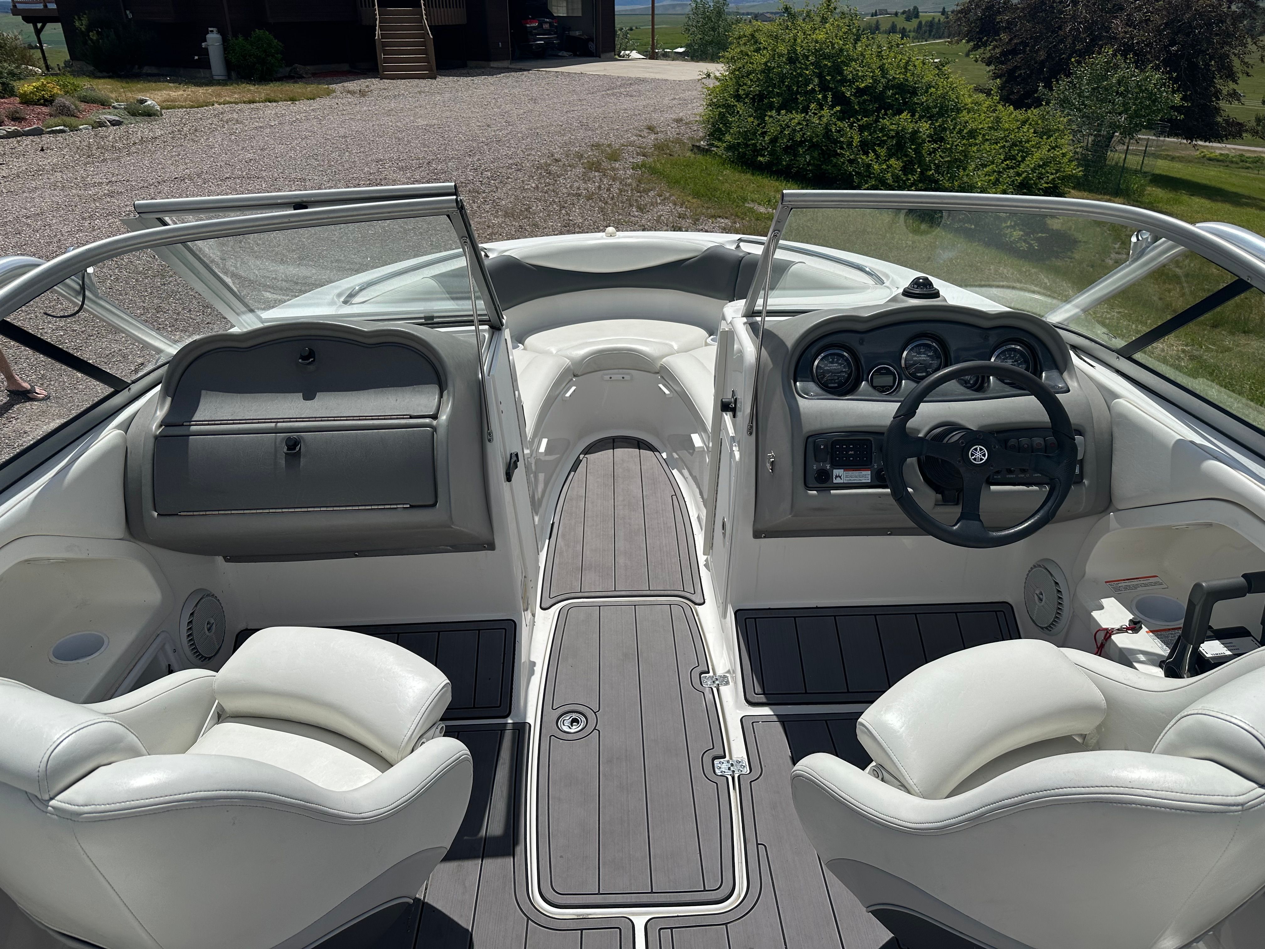 Interior of a 2005 Yamaha AR230 HO boat with steering console.