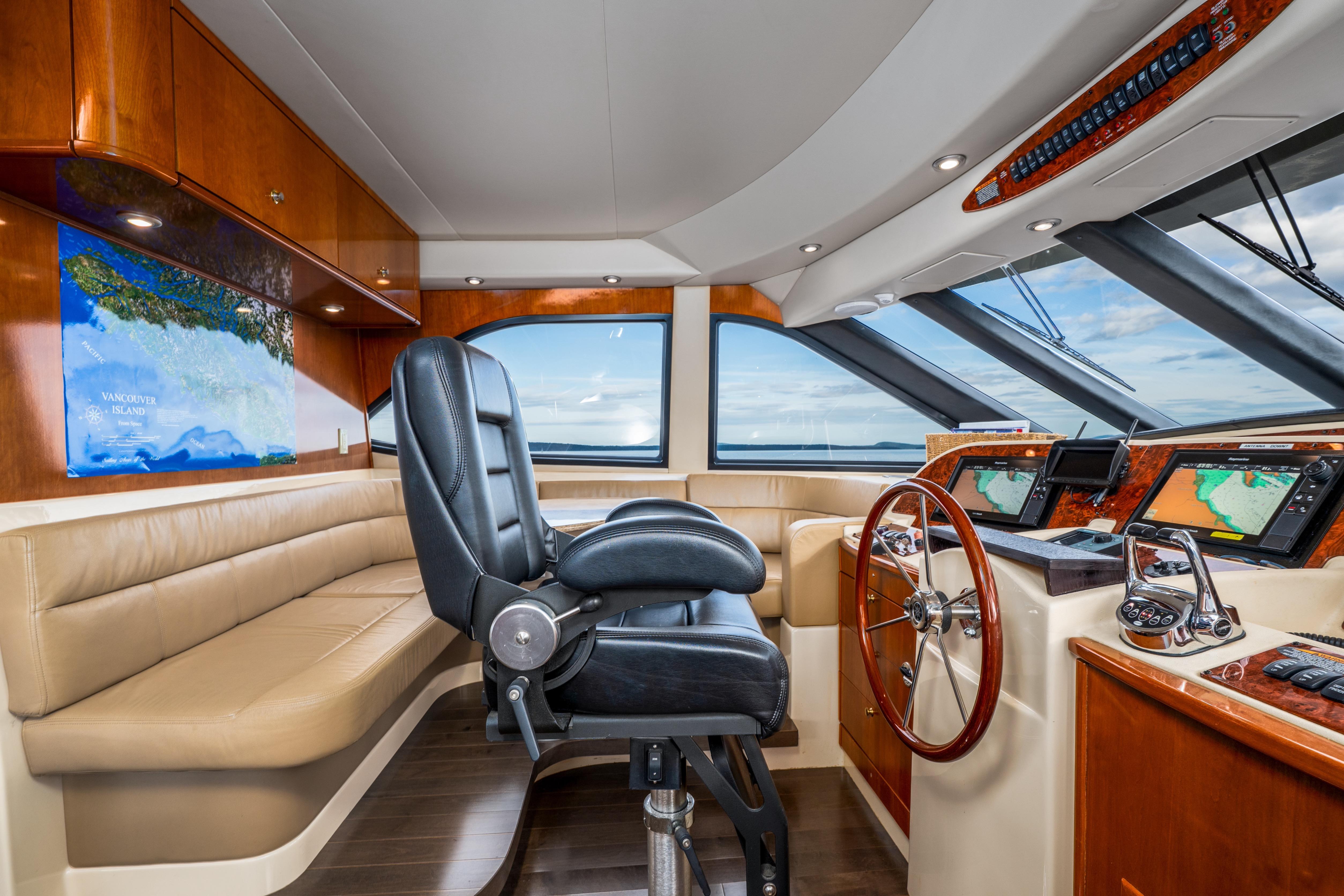 Luxurious 2007 Meridian 580 Pilothouse interior with leather seating and advanced navigation systems.