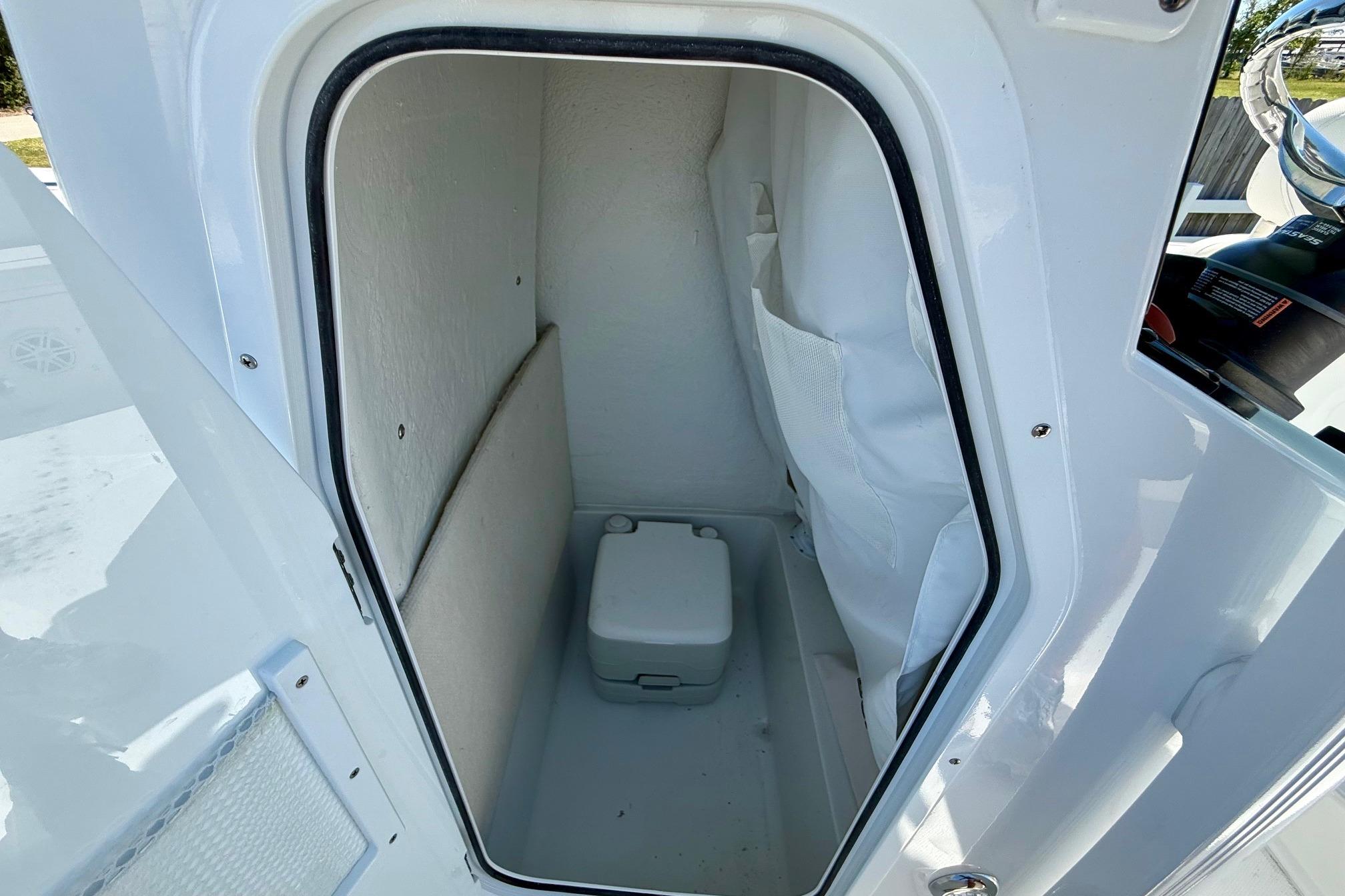 Interior storage compartment of 2026 Sea Hunt Ultra 229 boat.