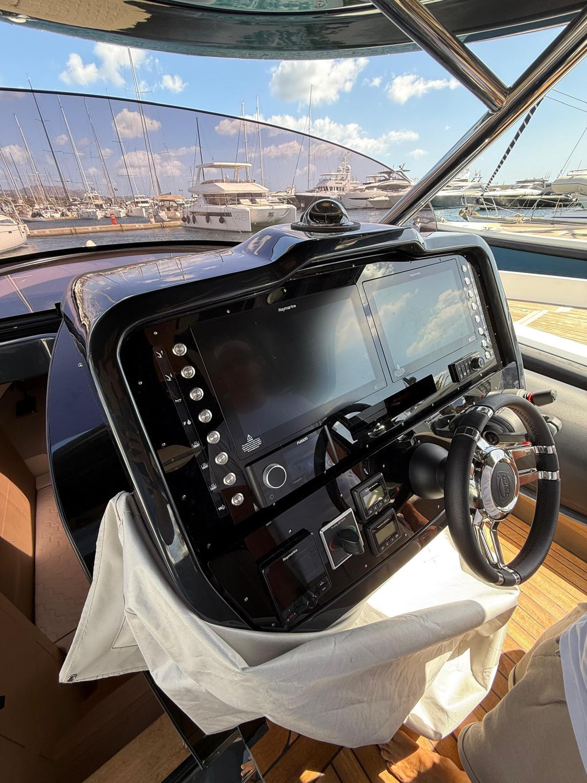 2024 SACS Strider 15 dashboard with modern navigation system and steering wheel.