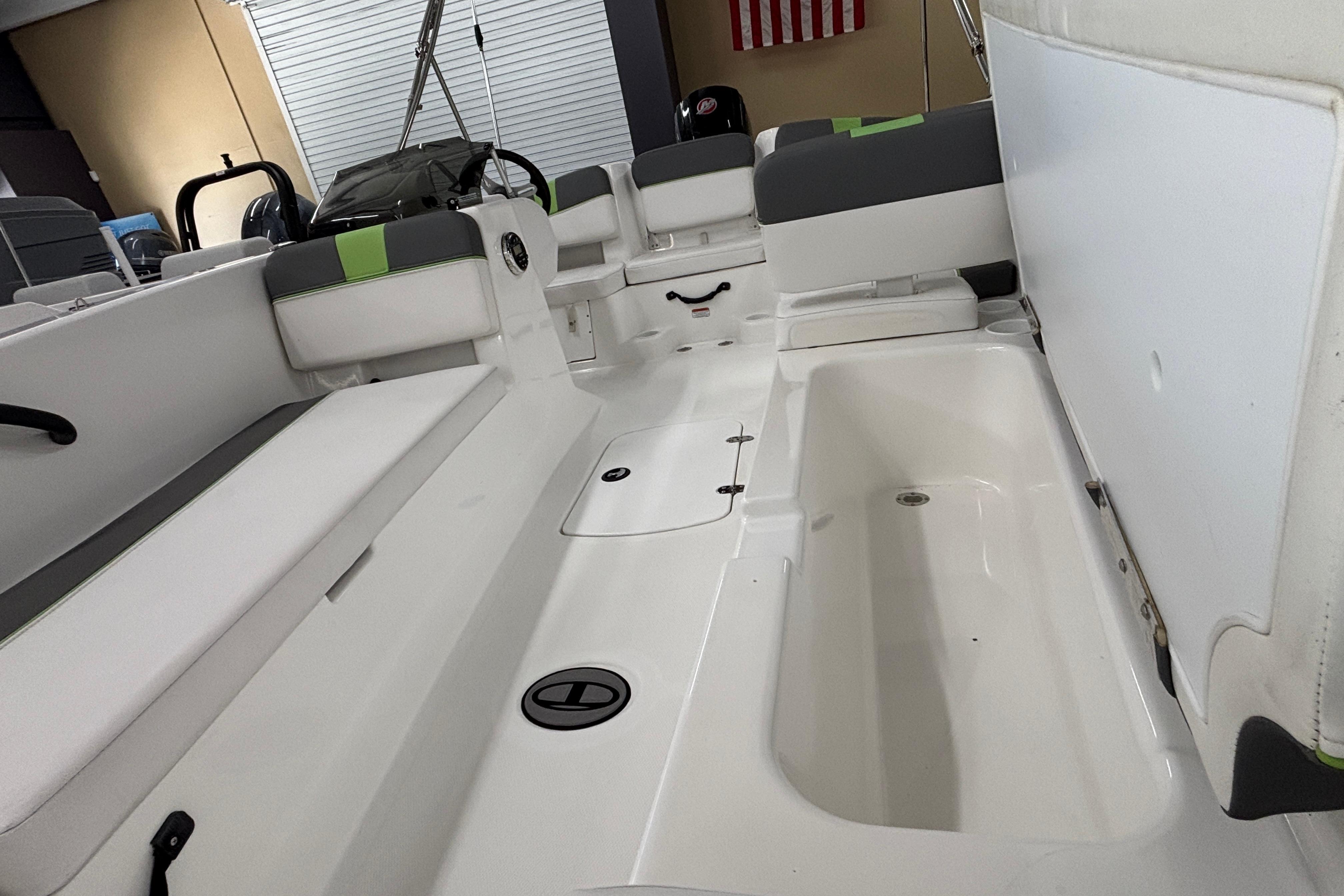 2024 Tahoe T18 boat interior with seating and storage compartments.