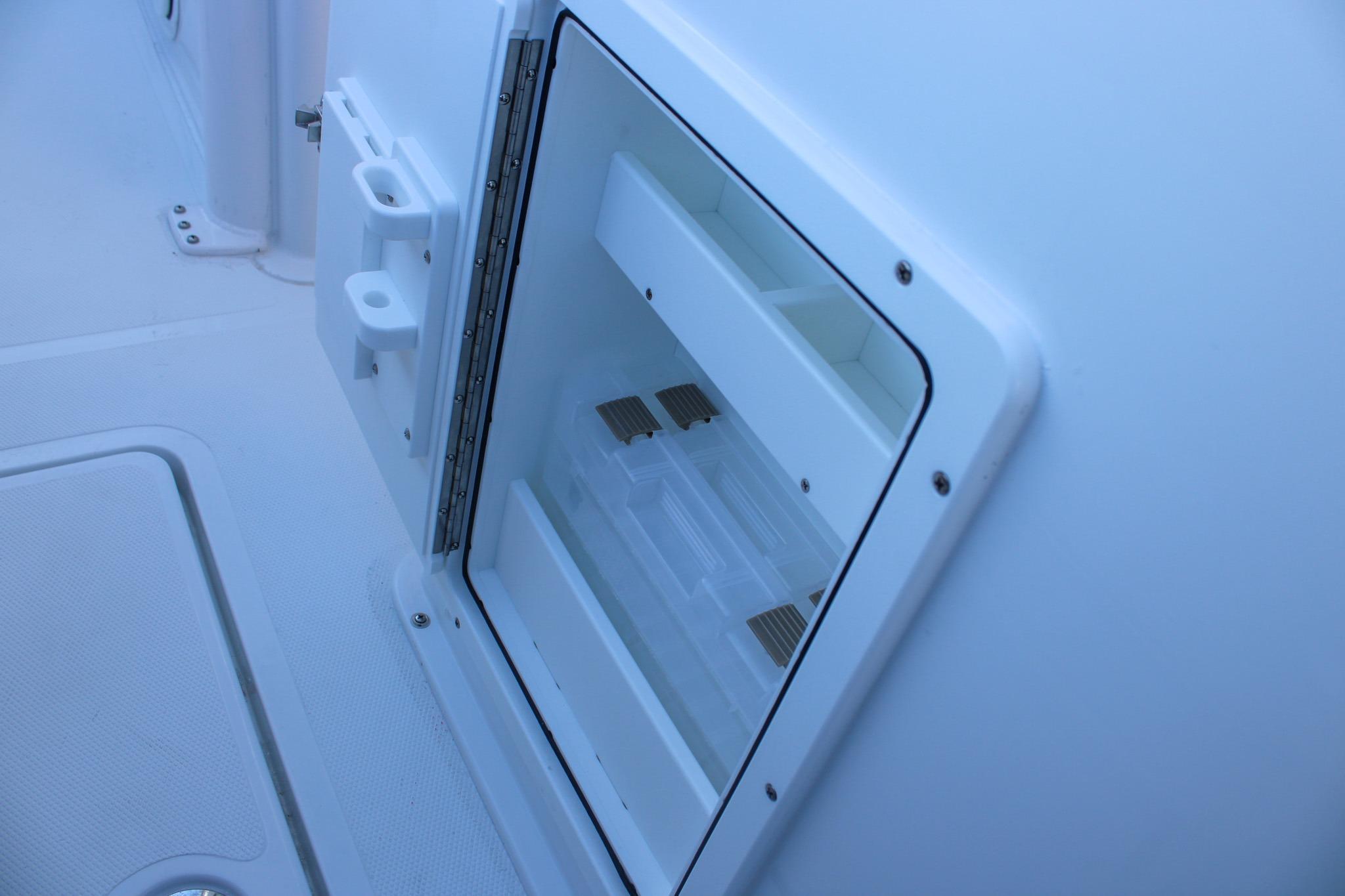 2026 Sea Hunt Gamefish 25 boat storage compartment detail.