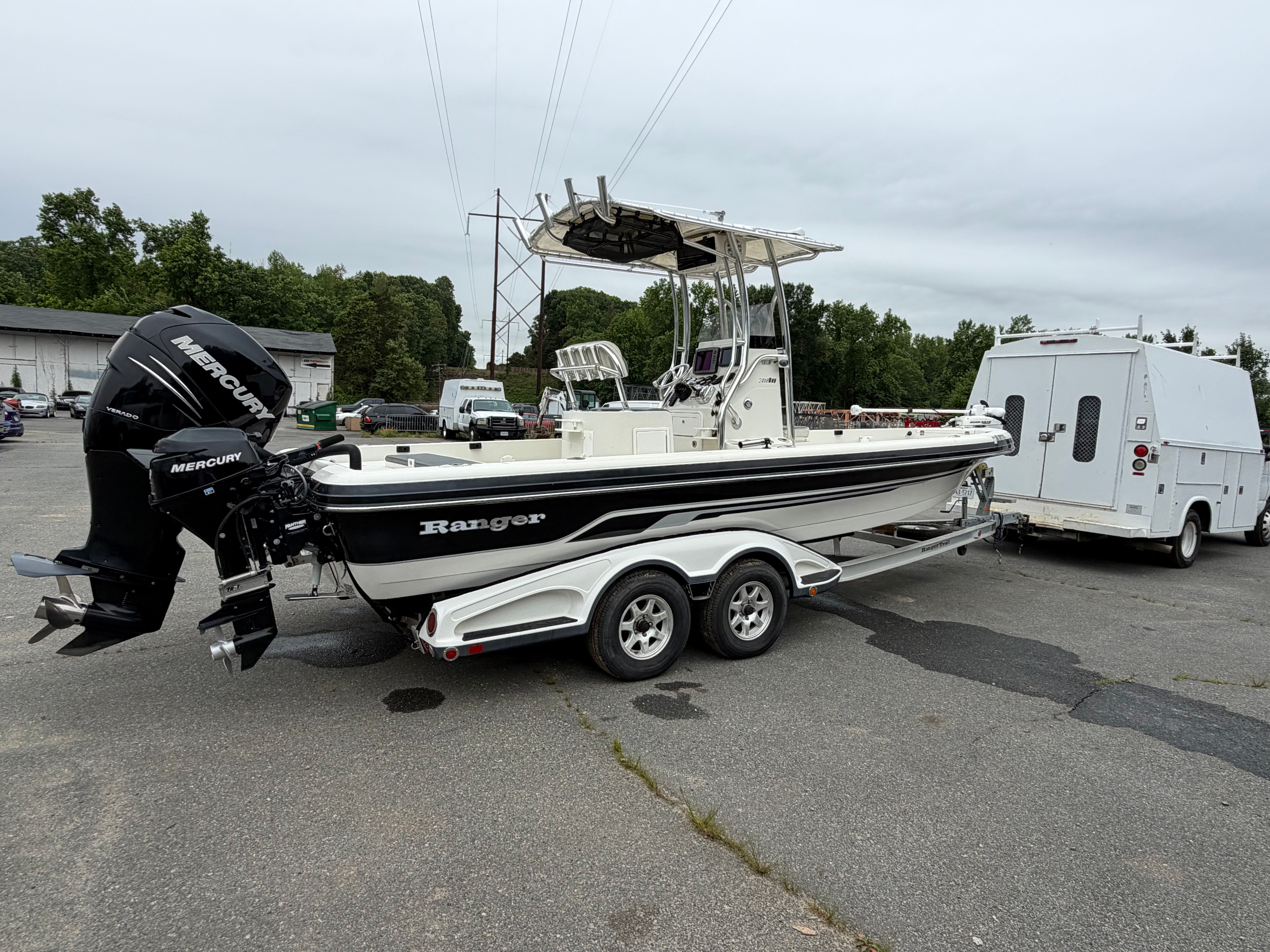 2008 Ranger 2400 Bay Ranger boat on trailer with Mercury engine.
