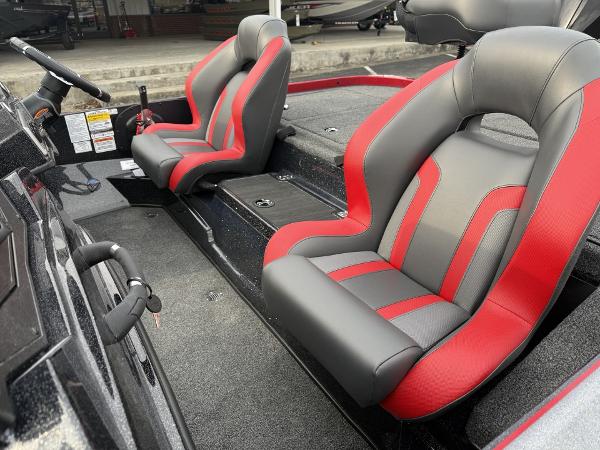 2025 Nitro Z19 boat interior with red and gray seats, showcasing modern design.