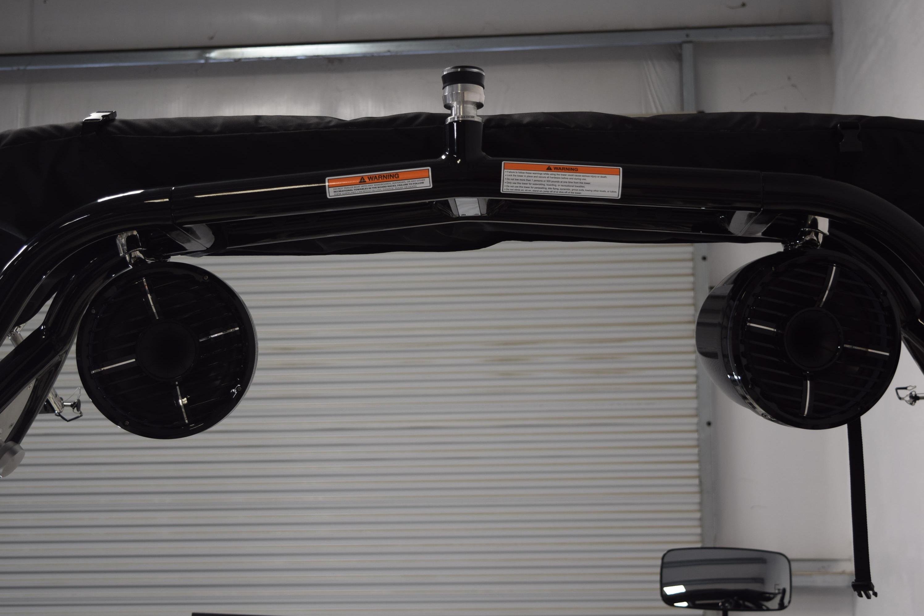 2026 Moomba Craz boat speakers and tower in a garage setting.