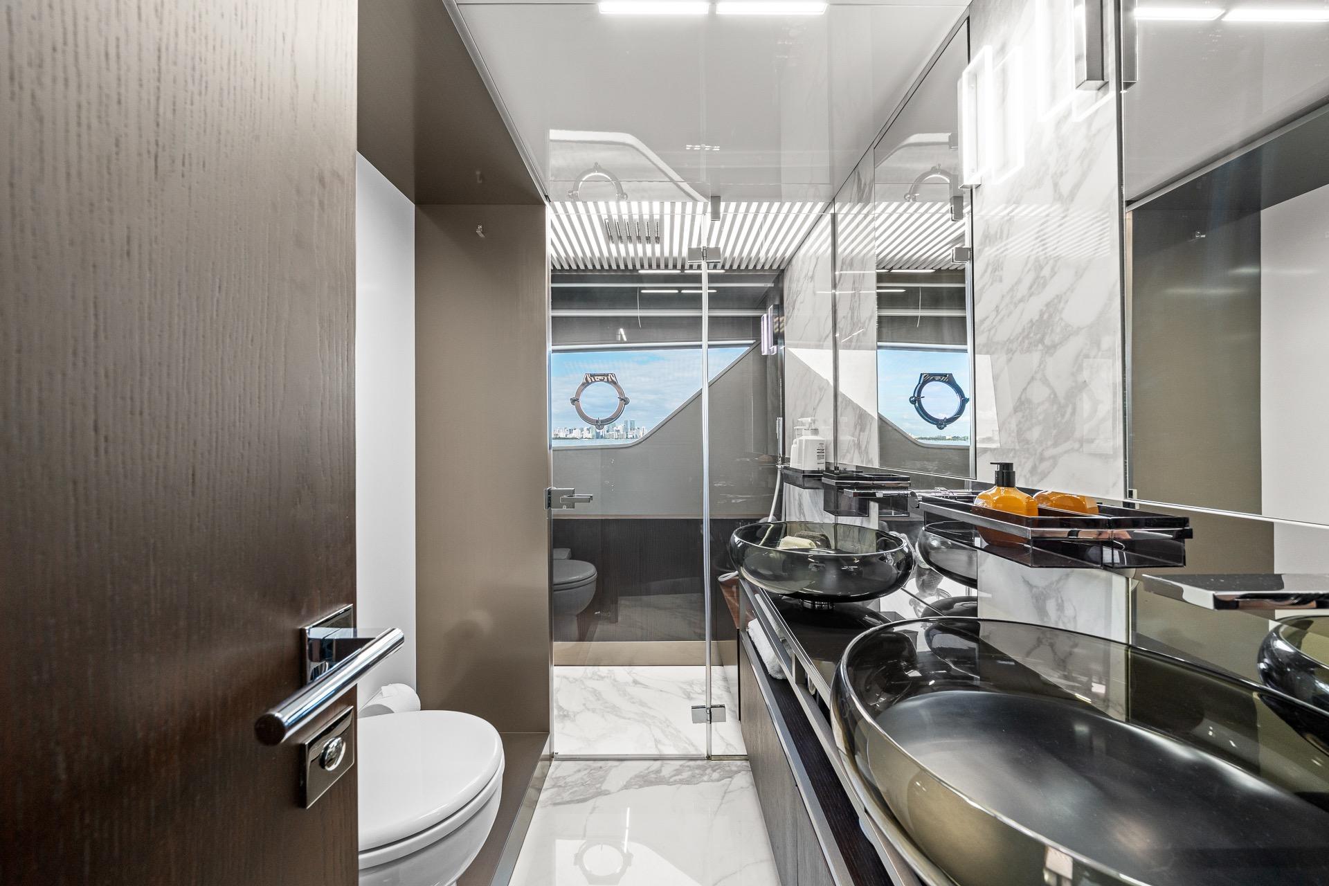 Luxurious bathroom interior of 2018 Ferretti Yachts 850 with modern fixtures and elegant design.