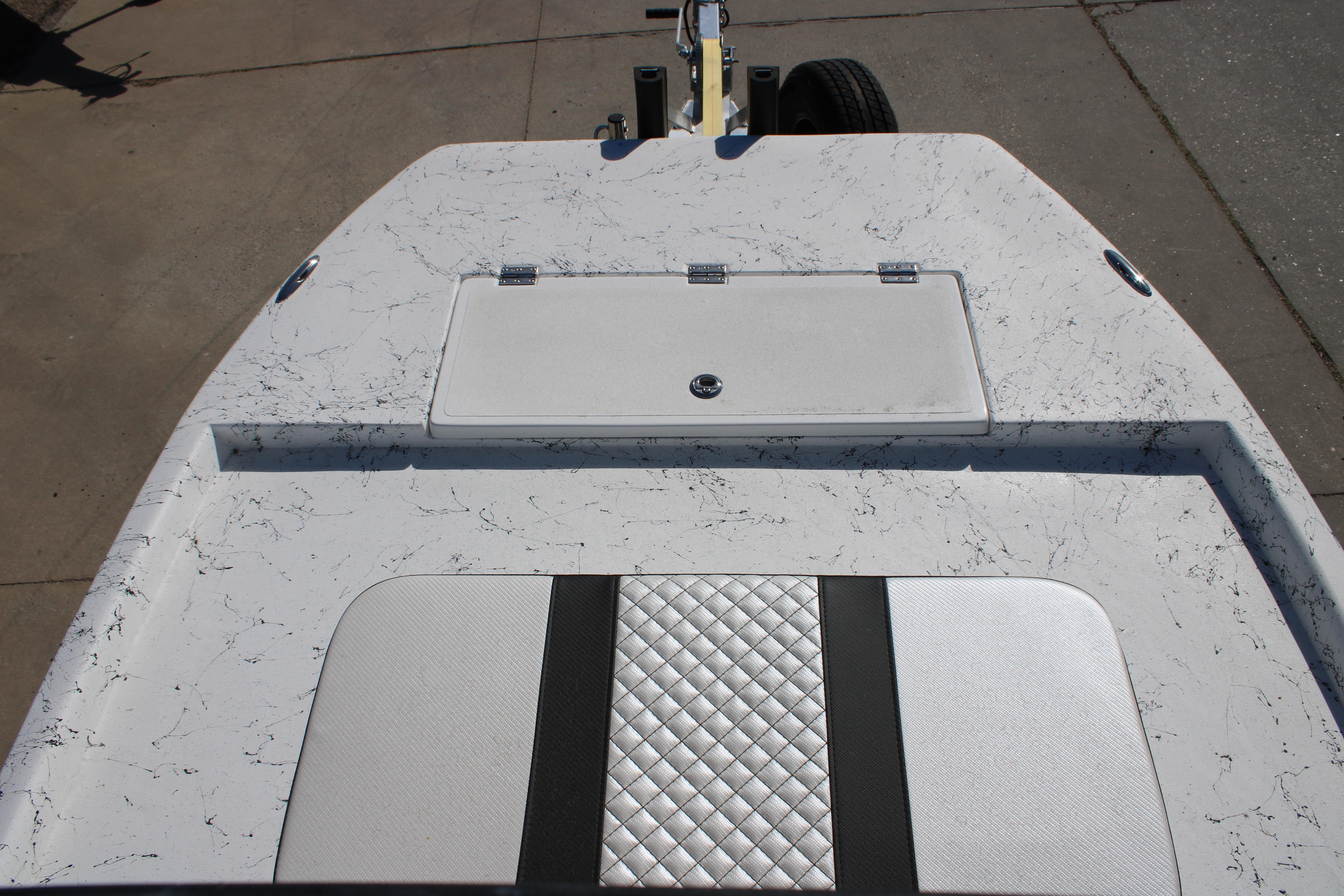 2026 Freedom Boats Chiquita deck with marbled finish and quilted seat design.
