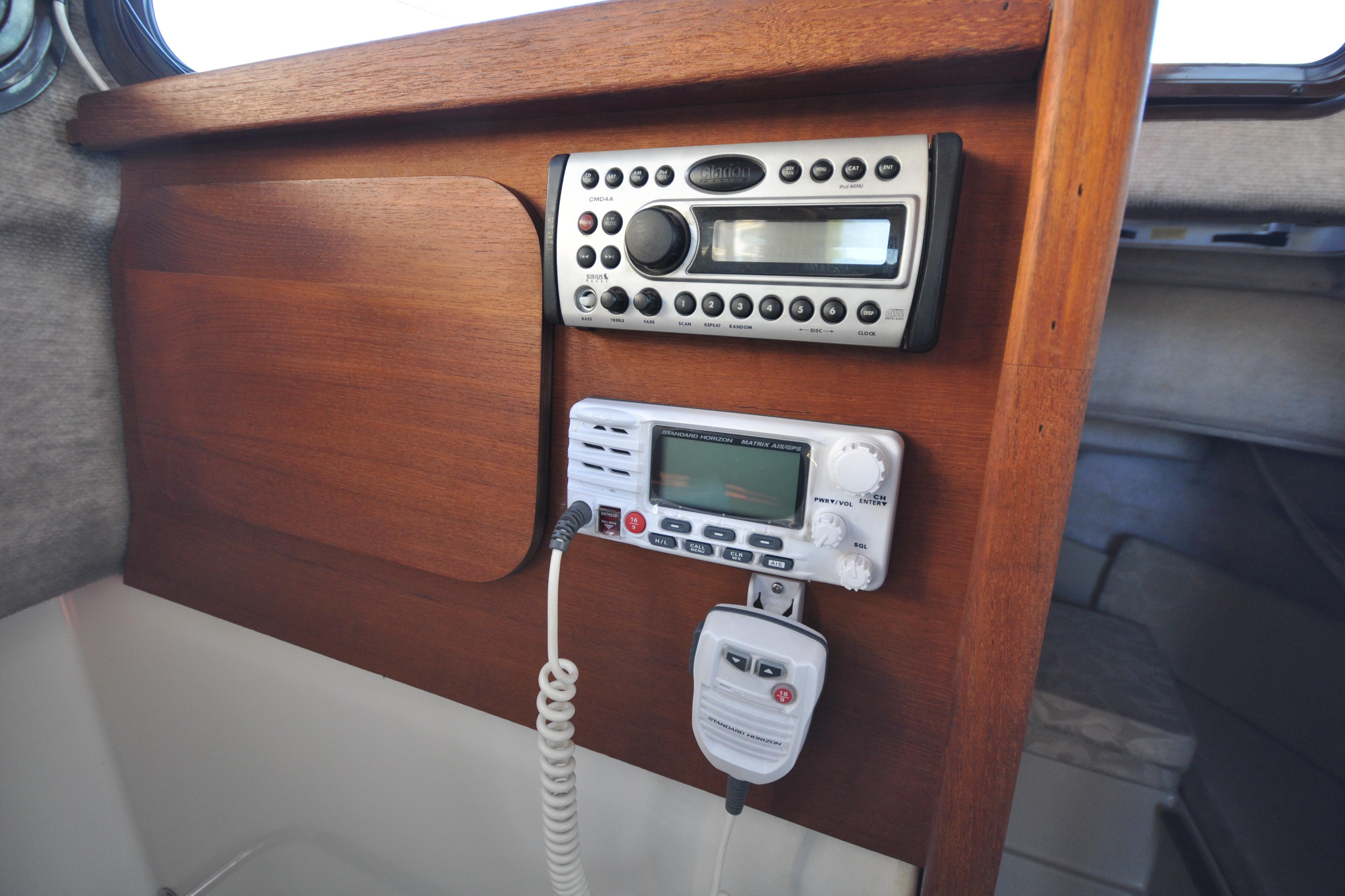 Control panel of a 2007 Ranger Tug R-25 with radio and navigation equipment.