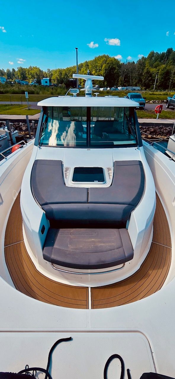 2017 Tiara Yachts Q44 with spacious deck and comfortable seating.