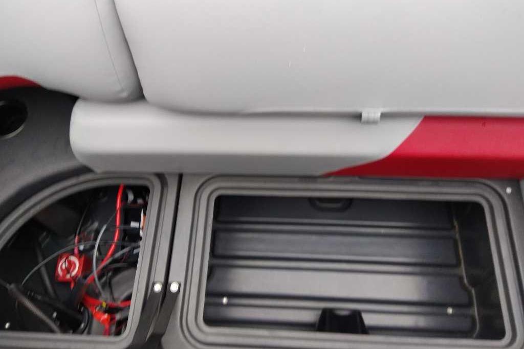 Interior storage compartment of 2026 Sun Tracker Party Barge 22 XP3 pontoon boat.