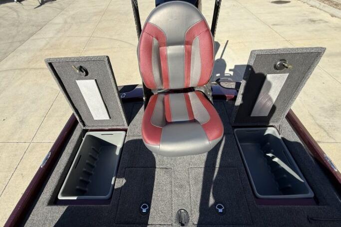 2026 Nitro Z21 XL Pro boat seat with storage compartments open.