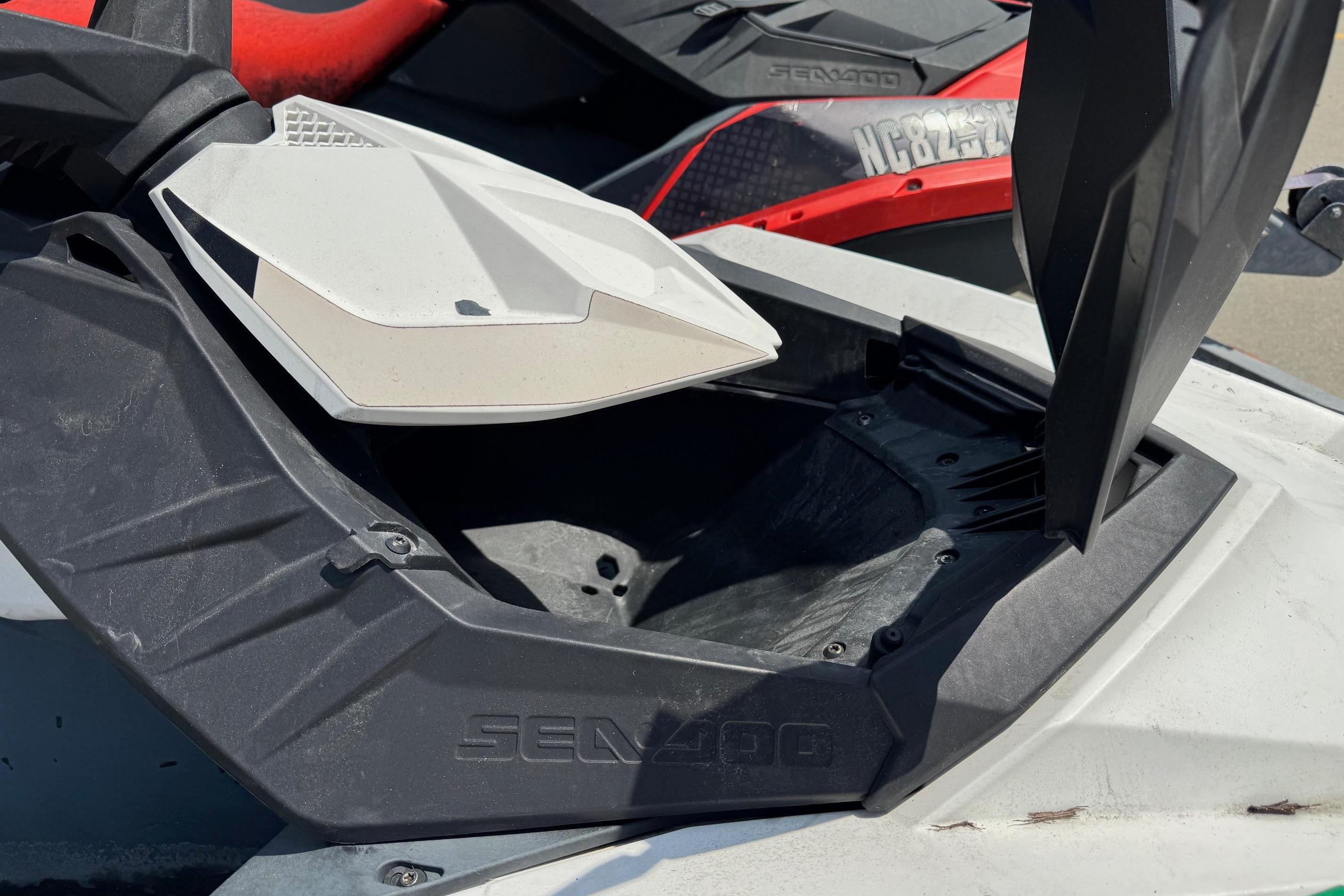 2017 Sea-Doo Spark 2up storage compartment open, showcasing interior space.