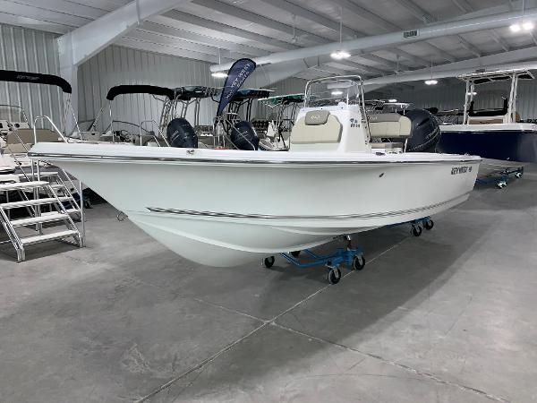 2024 Key West 188 Bay Reef boat displayed in a showroom.