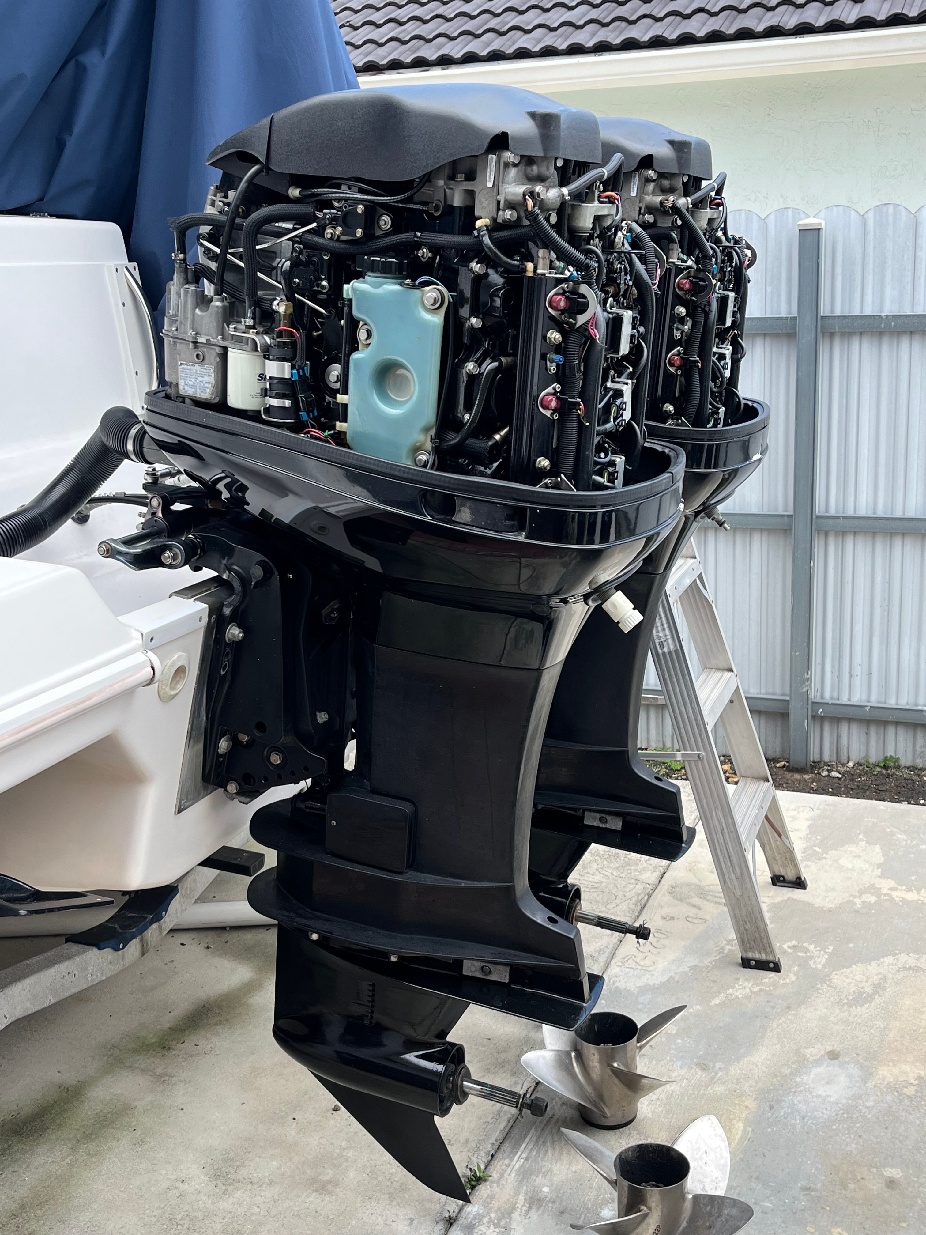 Close-up of 2001 Donzi 29 ZF outboard engines.