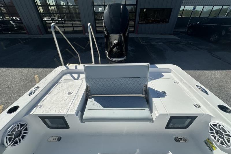 2026 Sportsman Masters 247 Bay Boat with seating and storage compartments.