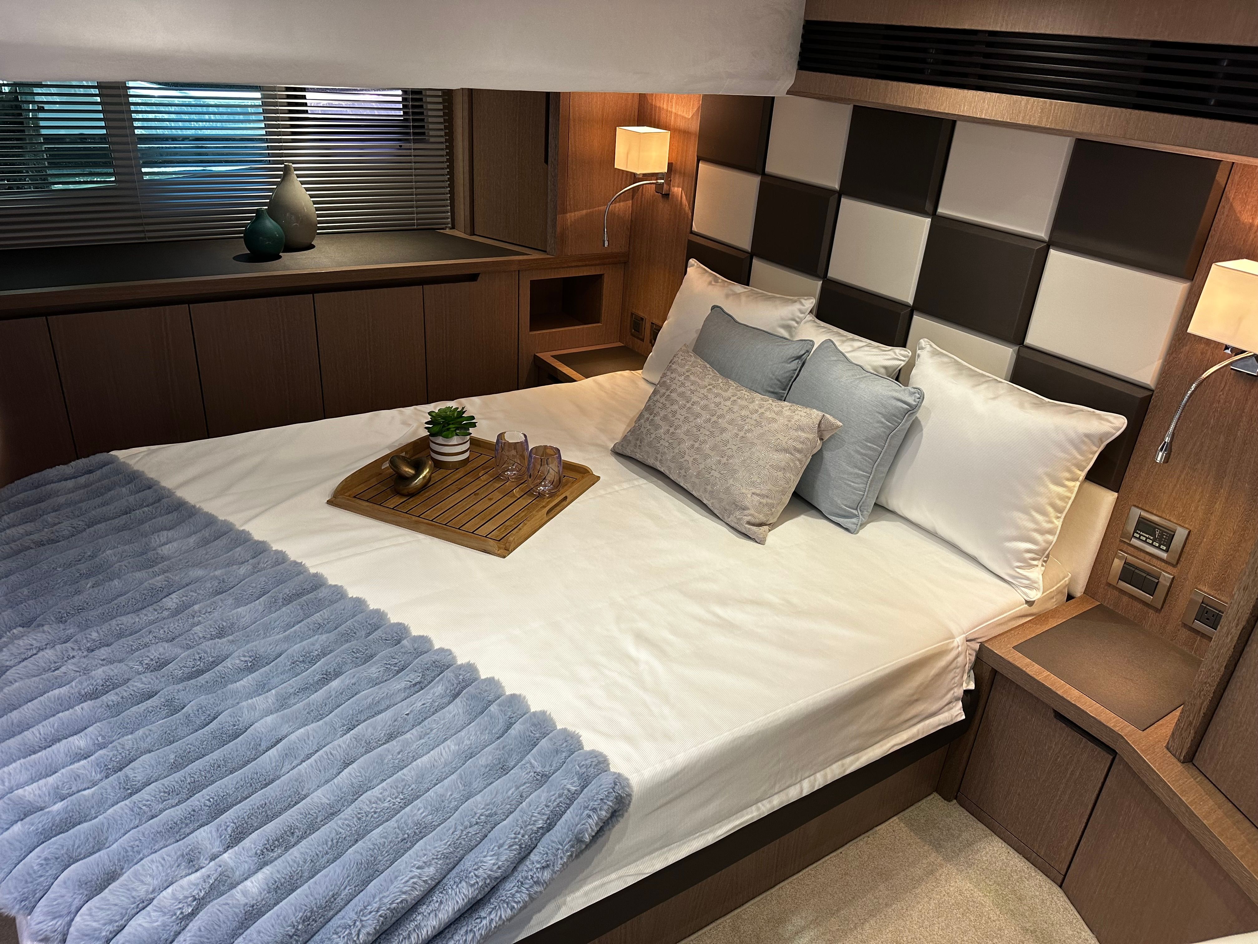 Luxurious bedroom in Galeon 485 HTS yacht, 2019 model.