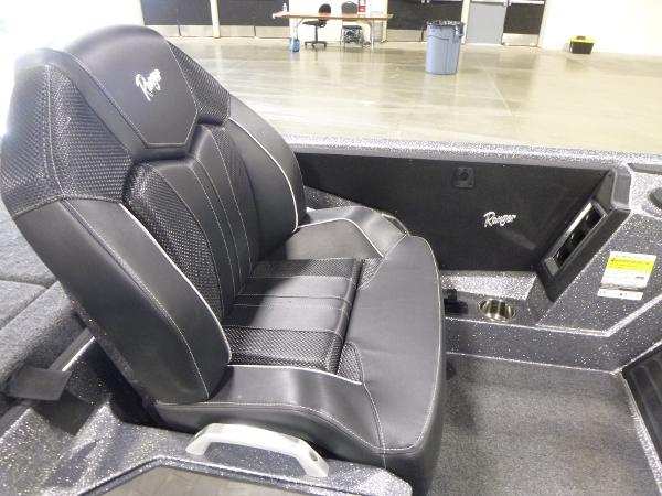 2025 Ranger Z520 boat seat, black leather with stitching, in a showroom setting.