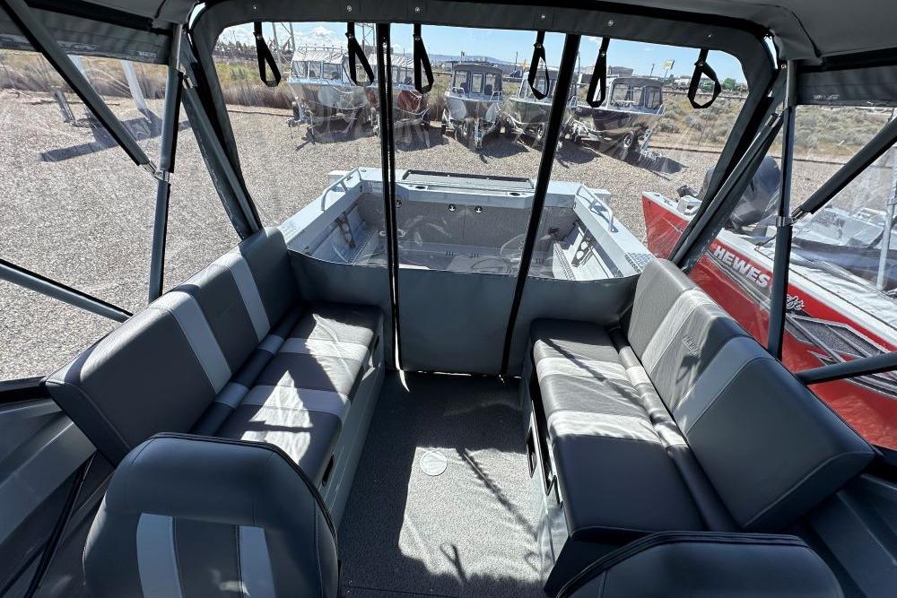 Interior view of 2026 Hewescraft 200 ProV ET boat with seating and canopy.
