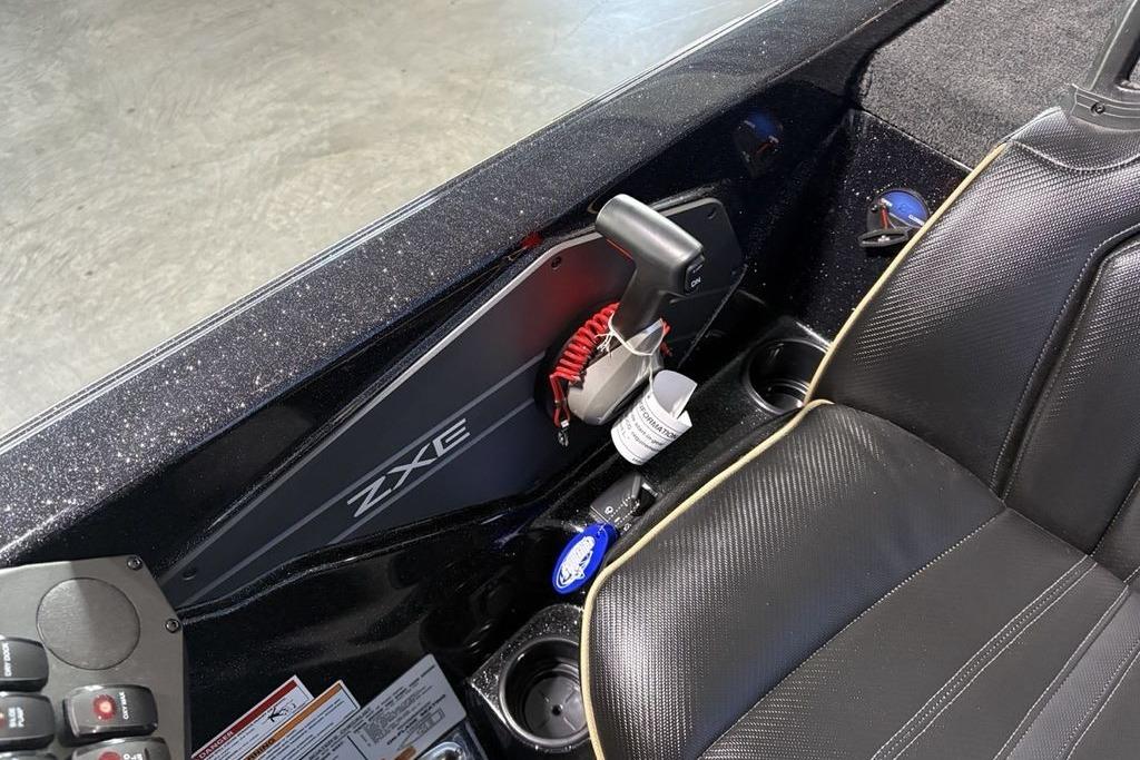 Interior of 2026 Skeeter ZXE21 boat with sleek black seating and control panel.