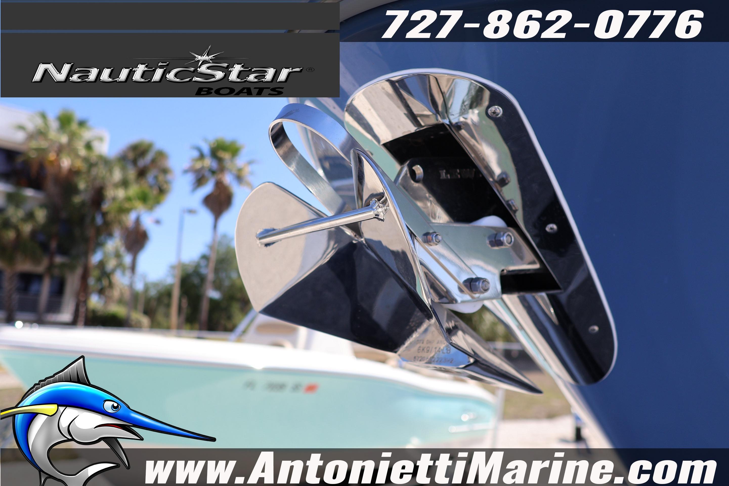 NauticStar 292 Legacy boat detail with propeller, showcasing sleek design and branding.