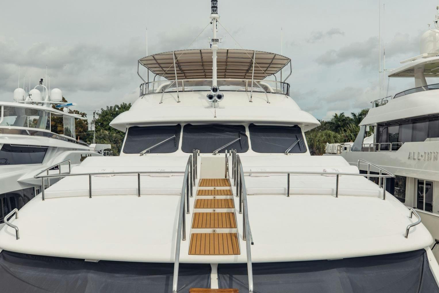 Luxury 2007 Benetti 120 Classic yacht docked, showcasing sleek design and spacious deck.
