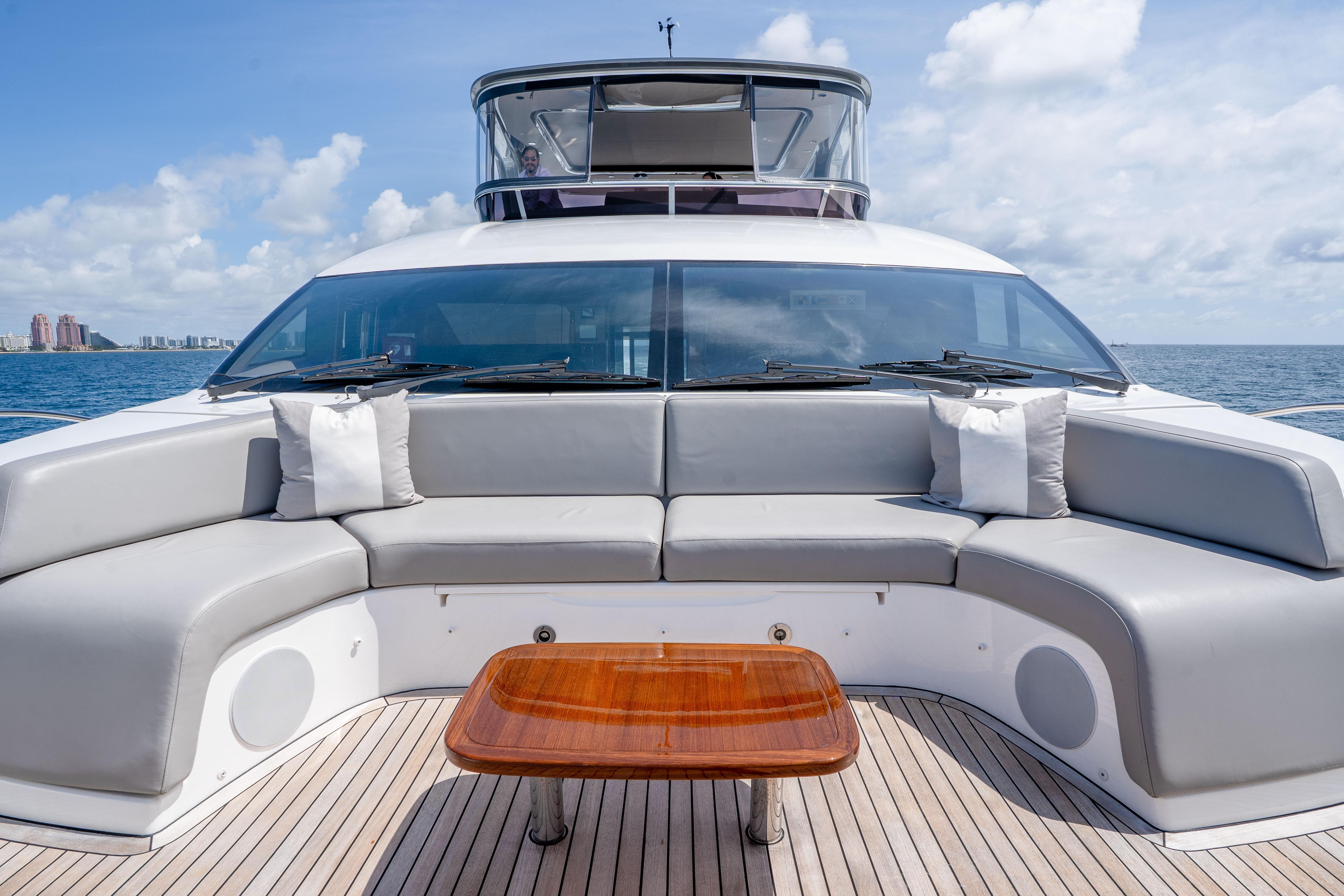 Luxurious 2020 Princess Y85 yacht deck with elegant seating and ocean view.