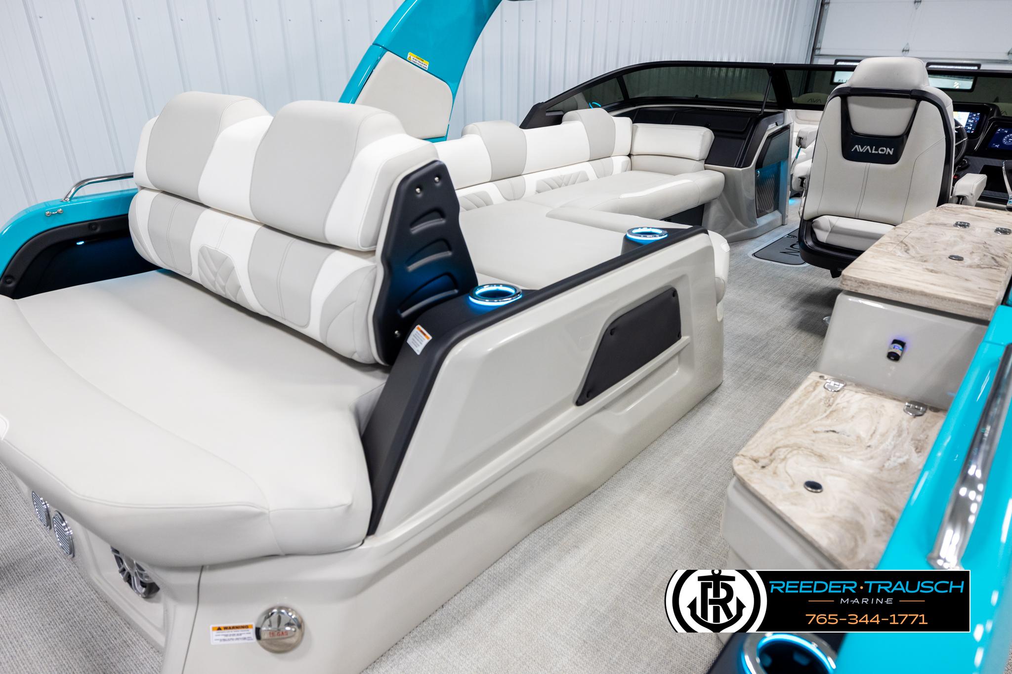 Luxurious interior of 2025 Avalon 2585 Excal VRBW boat with plush seating and modern design.