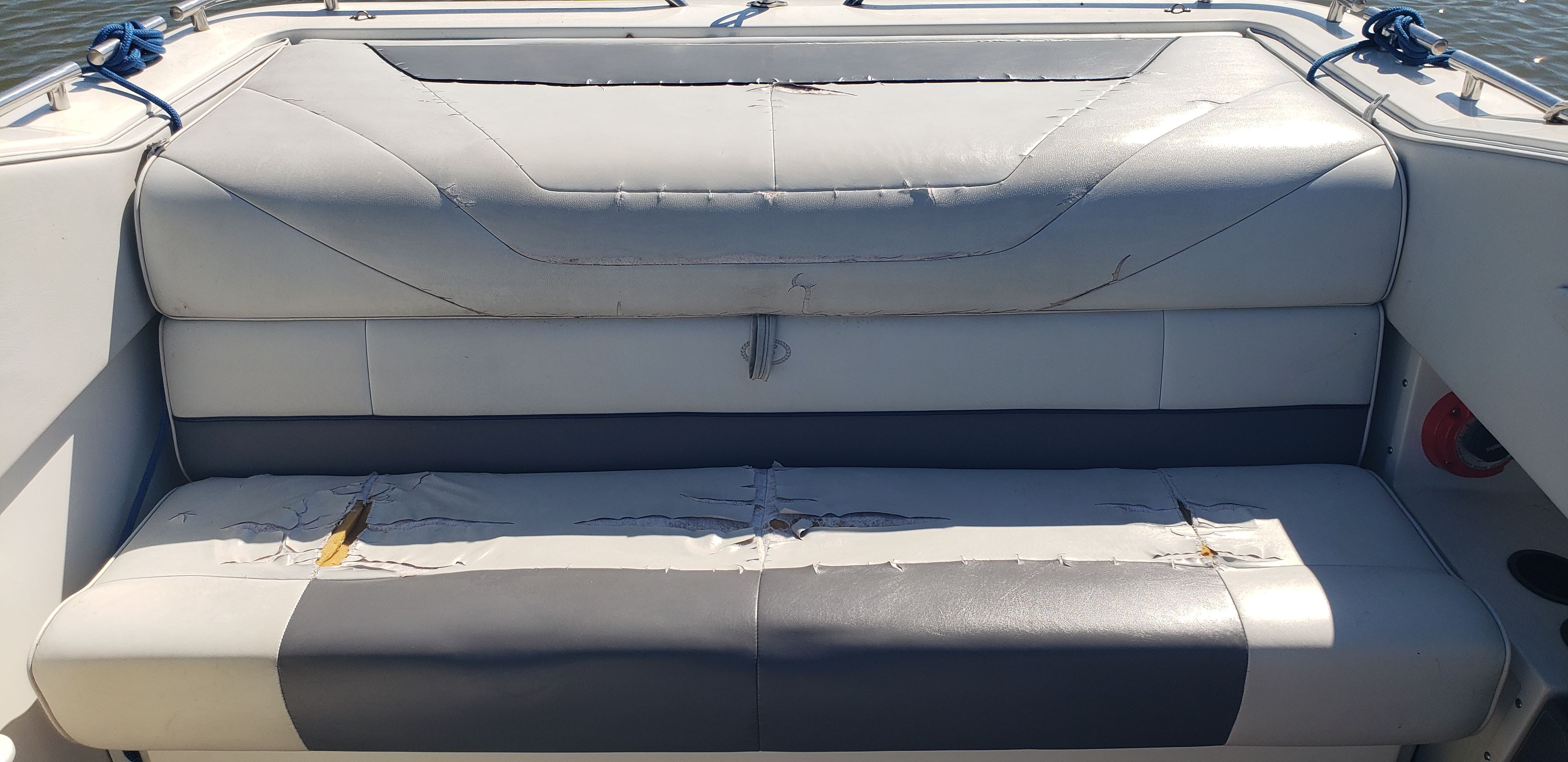 Worn seating of a 1993 Cobalt 272 boat.