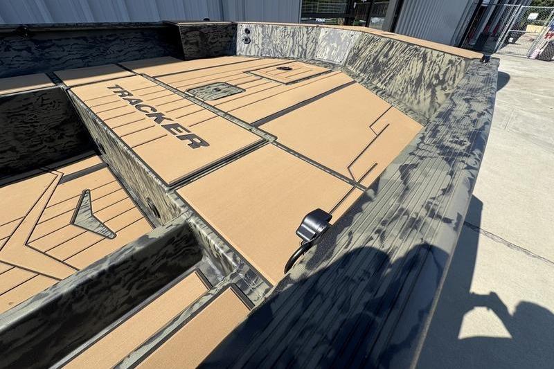 2026 Tracker Grizzly 1756 T Marsh boat interior with camo design and spacious deck.