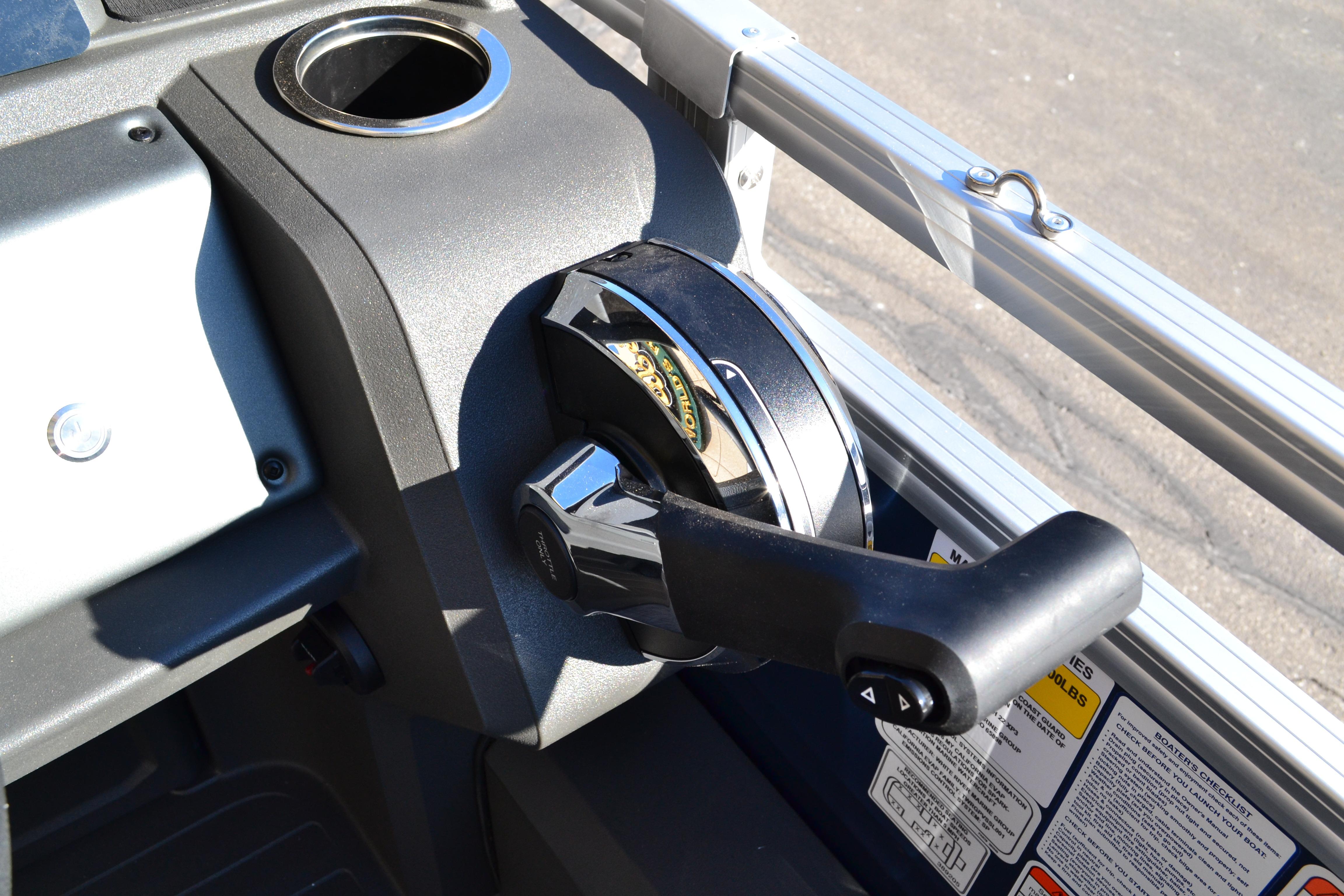 Throttle control of 2026 Sun Tracker SportFish 22 XP3 boat, featuring sleek design and functionality.