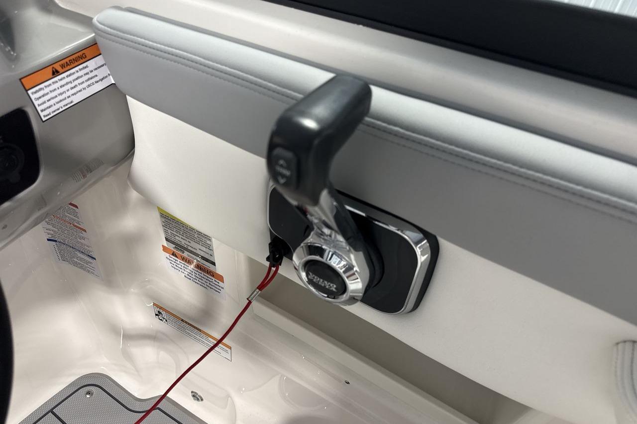 Close-up of a boat throttle lever in the 2026 Chaparral 23 SSi.