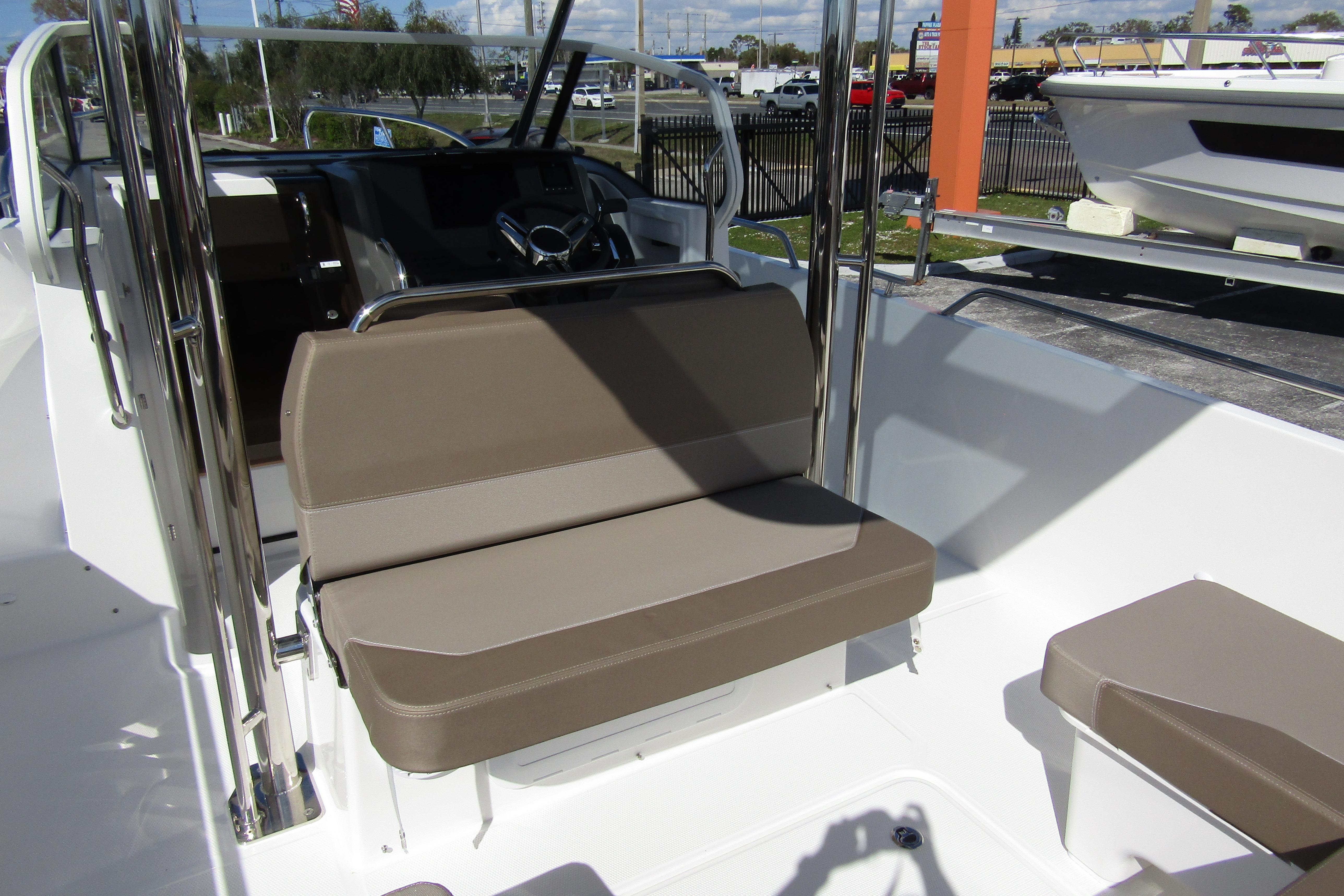 Interior of Nimbus Tender 9 boat, 2026 model, featuring beige seating.