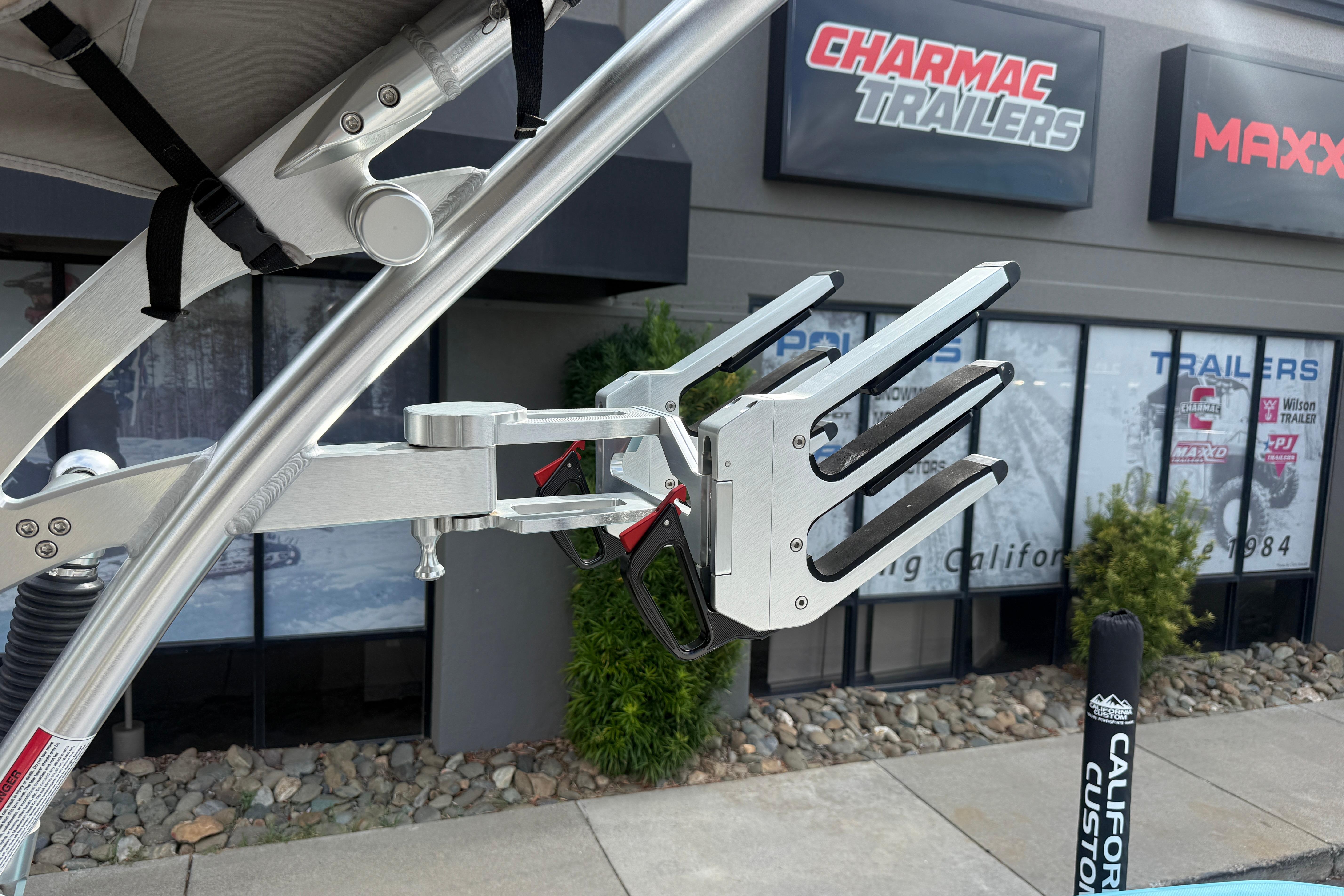 2018 MasterCraft XT21 wakeboard rack detail at a trailer dealership.