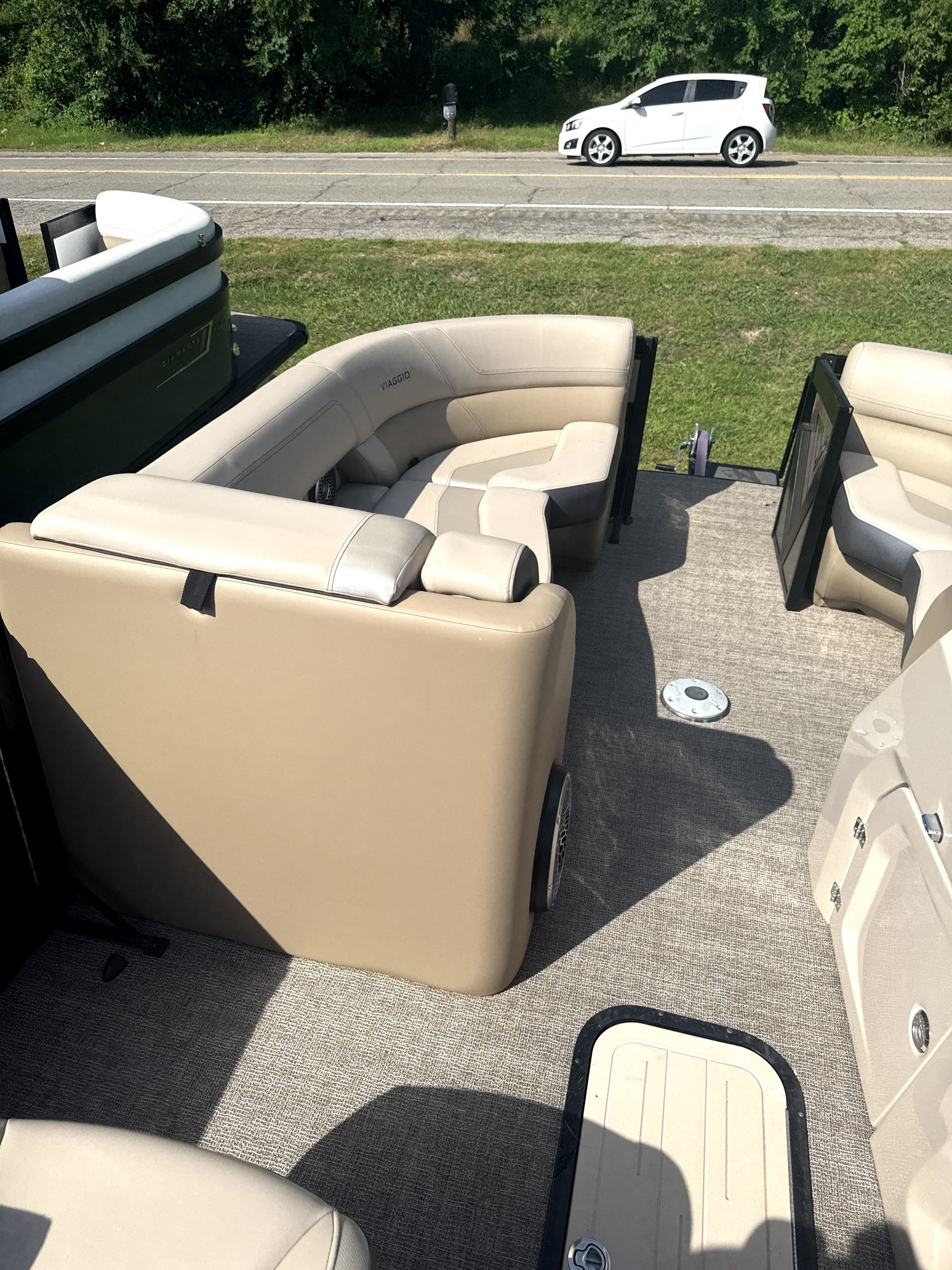 Interior of 2023 Viaggio Diamante D23S with beige leather seating.
