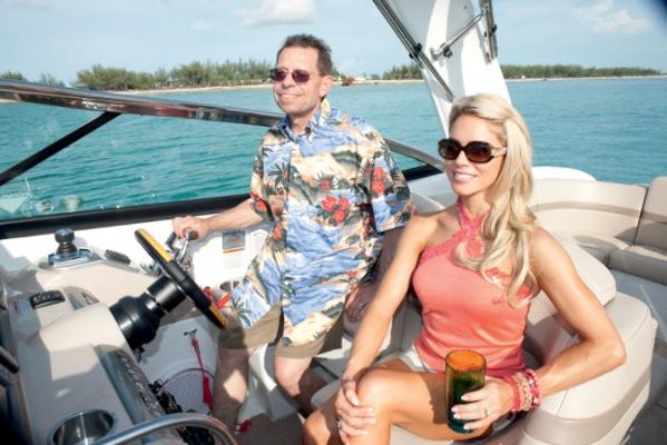 Manufacturer Provided Image: Couple enjoying a ride on a 2013 Formula 350 Sun Sport boat.