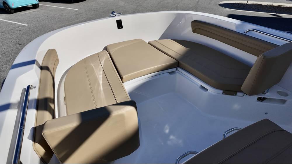 2025 Bayliner Trophy 22 CC boat interior with beige seating.