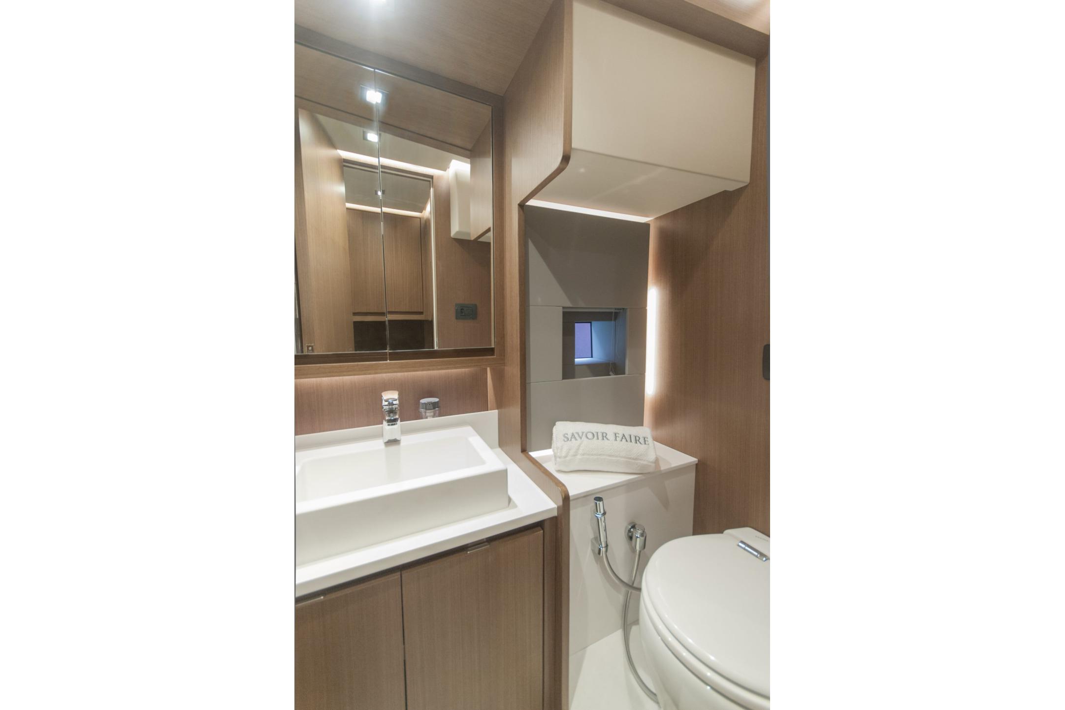 Modern bathroom interior in 2025 MCP Global Exp 68 yacht, featuring sleek design and fixtures.