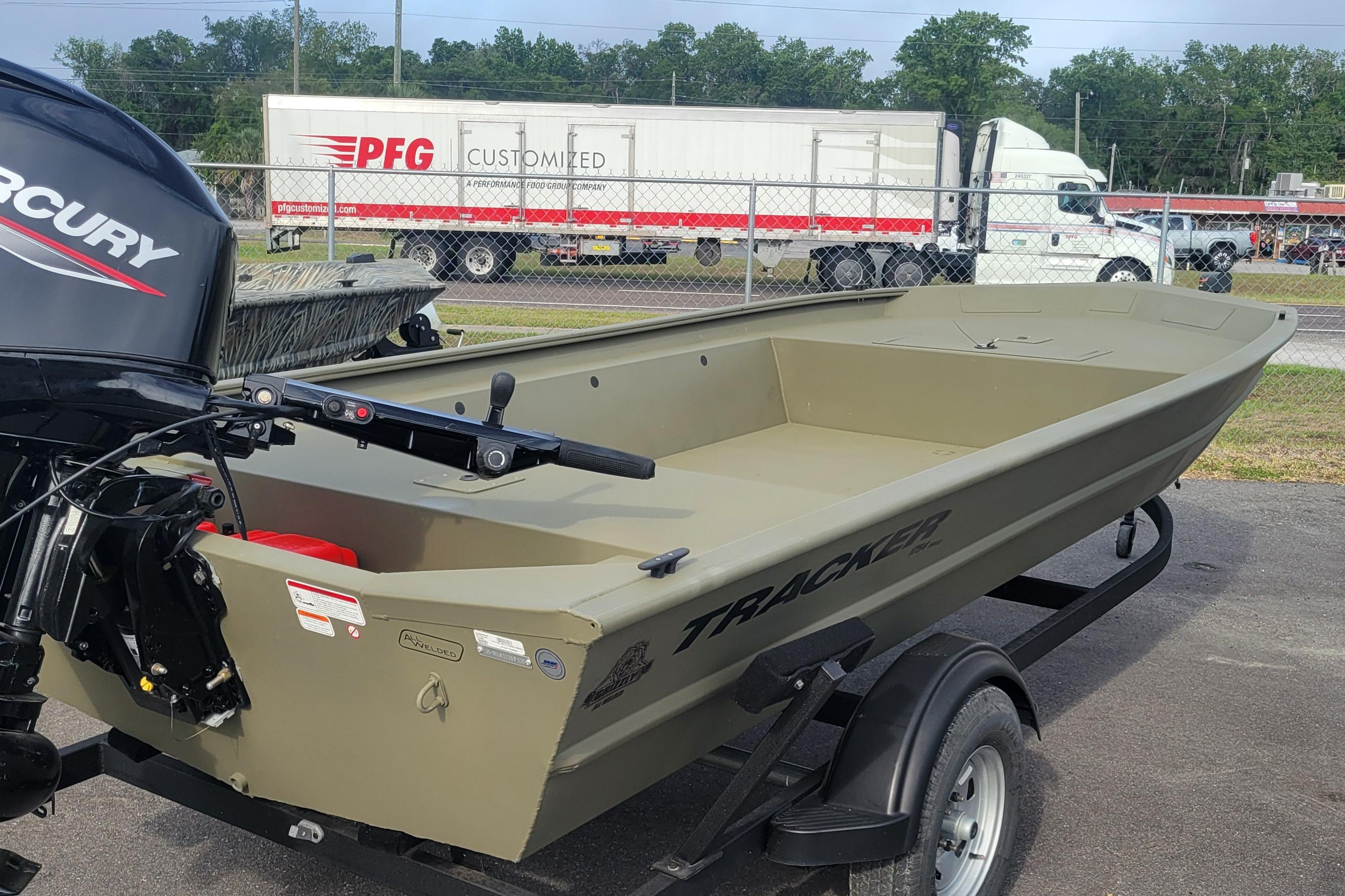 2026 Tracker Grizzly 1754 Utility boat on trailer with Mercury outboard motor.