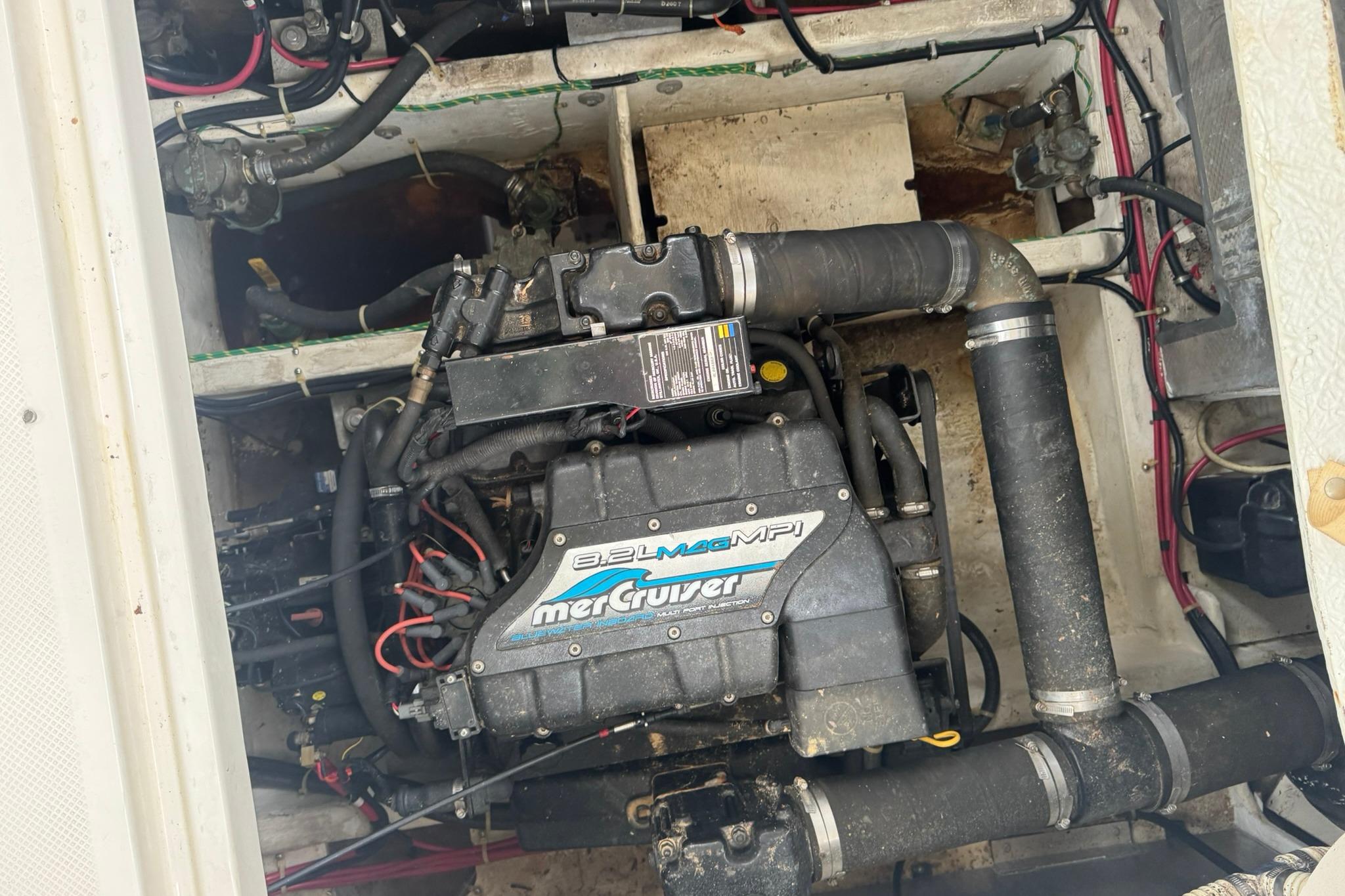 Engine compartment of a 1998 Maxum 3700 SCR with MerCruiser 8.2L MPI engine.