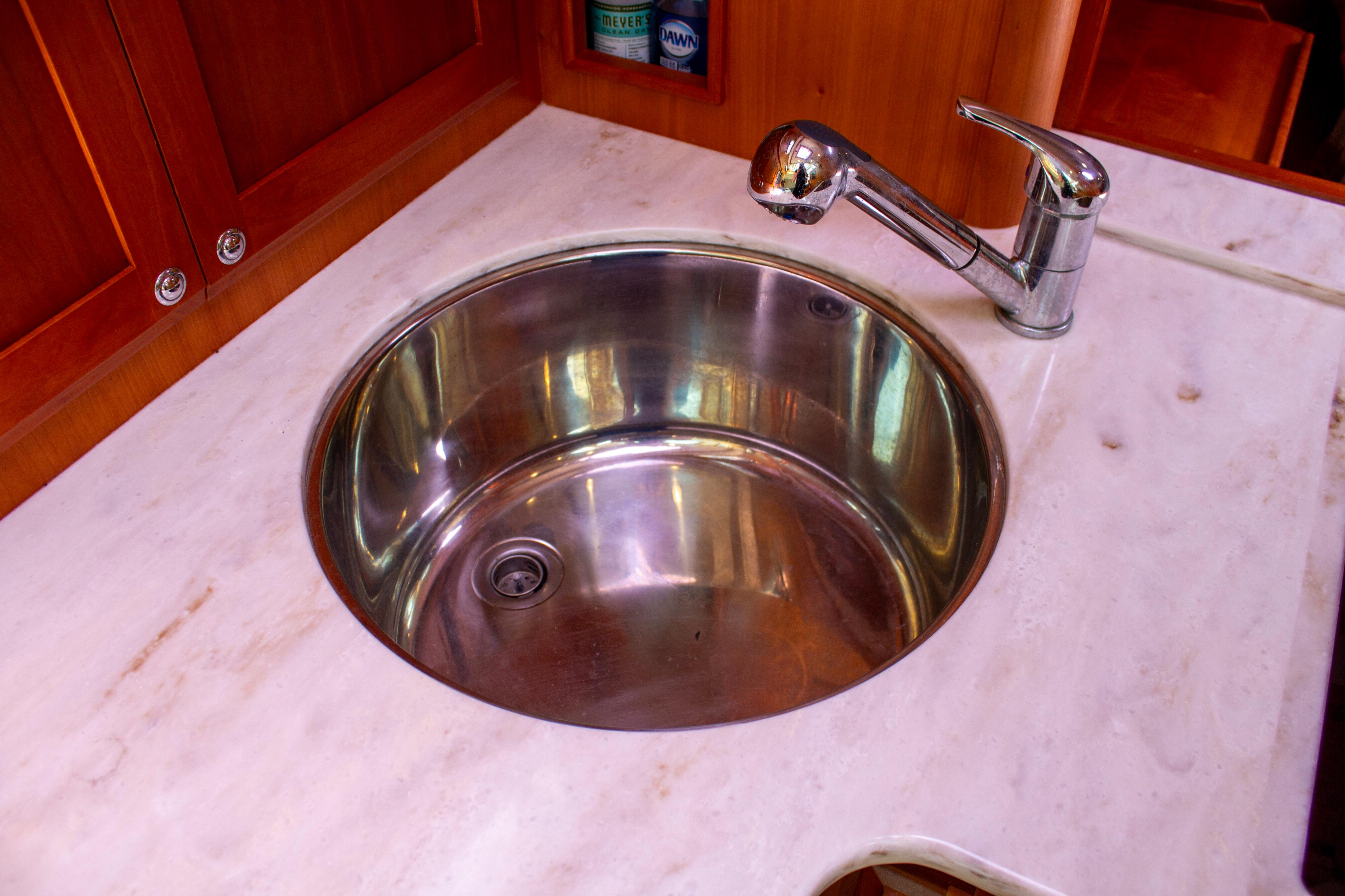 Stainless steel sink and faucet on Sabre 38 Salon Express yacht, 2013 model.