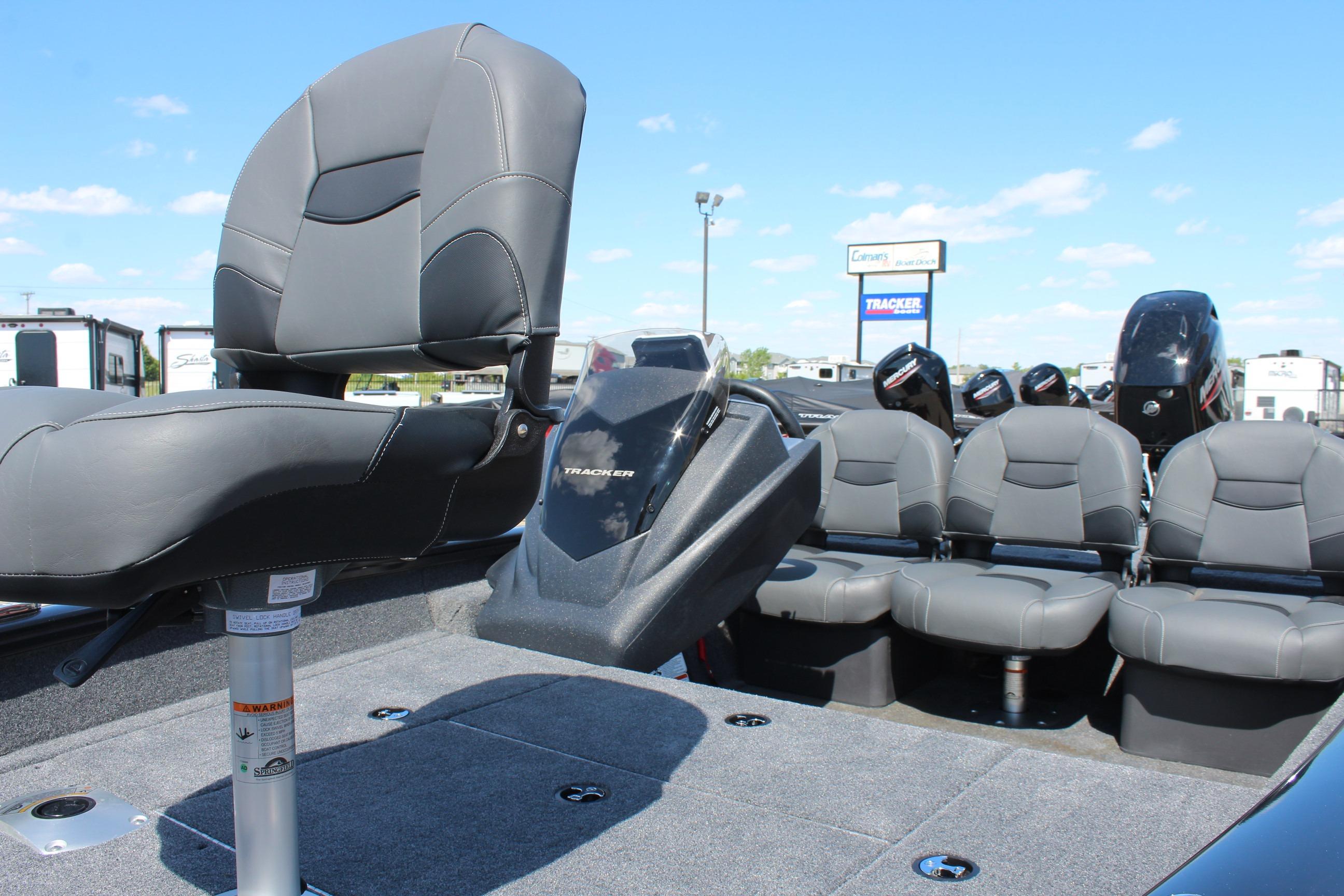 2026 Tracker Pro Team 175 Crappie Edition boat with gray seating and motor.