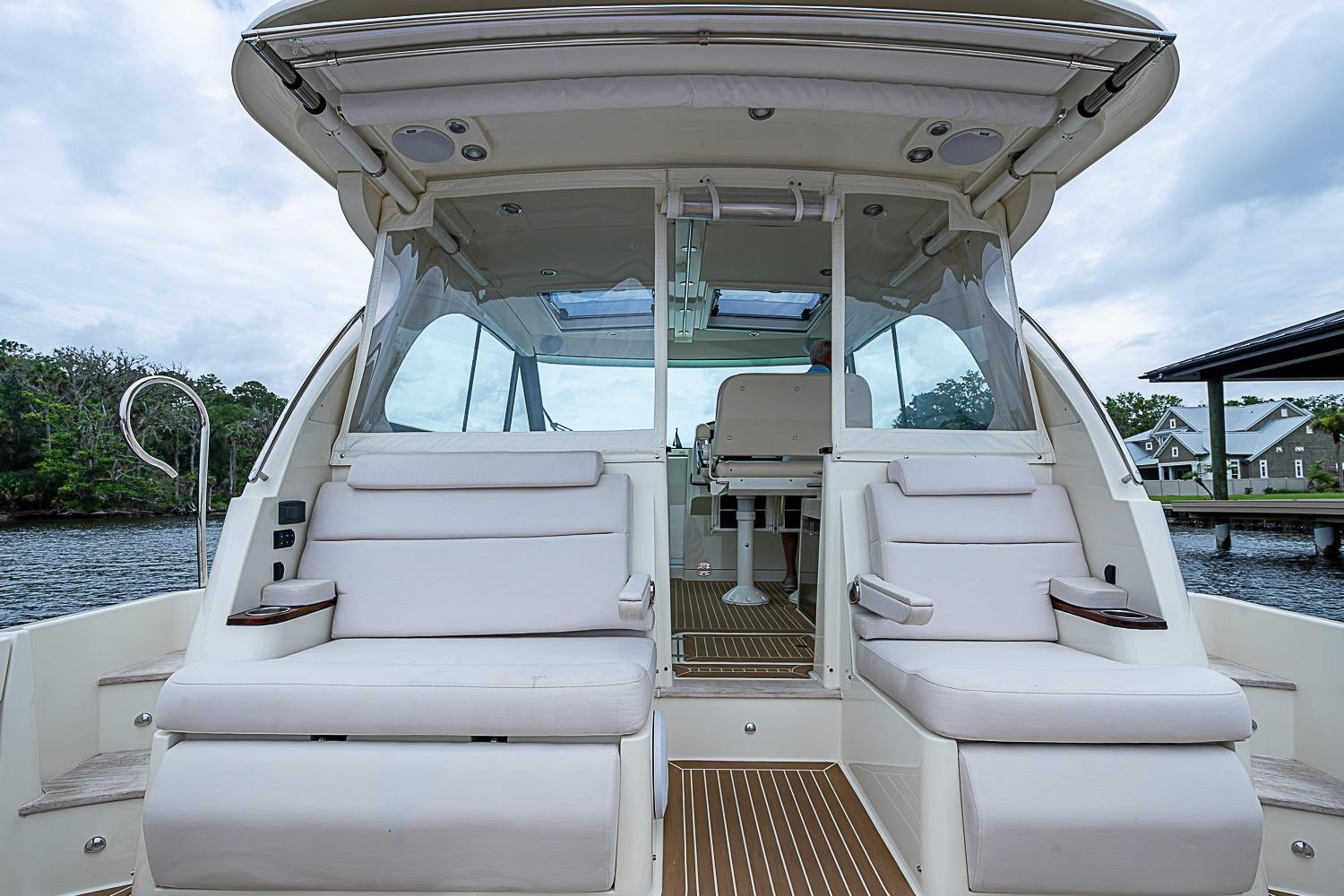 2023 Hinckley Sport Boat 40 X interior with plush seating and modern design.