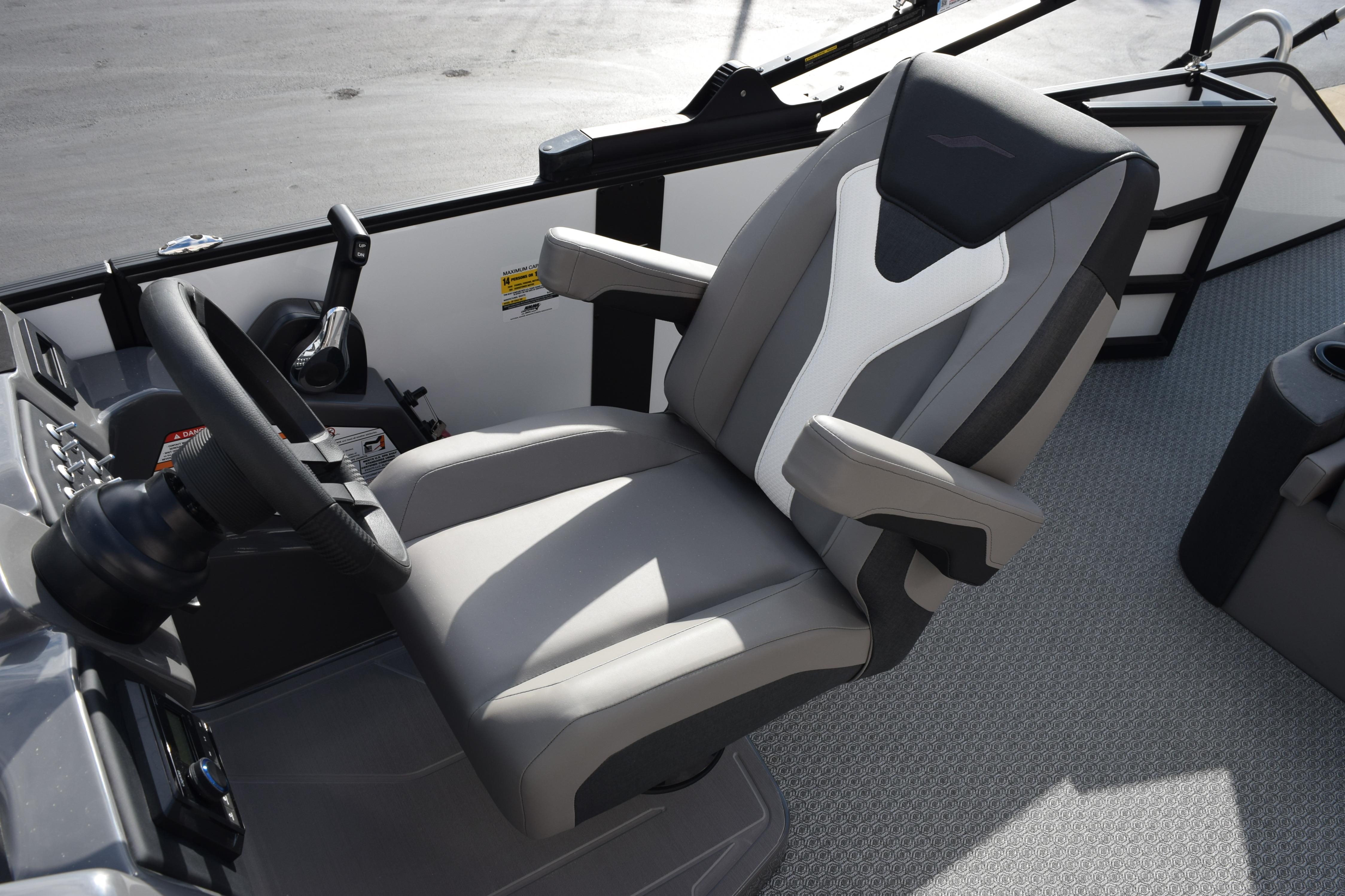 Captain's chair in 2026 Evotti 523CS boat, featuring sleek design and comfortable seating.