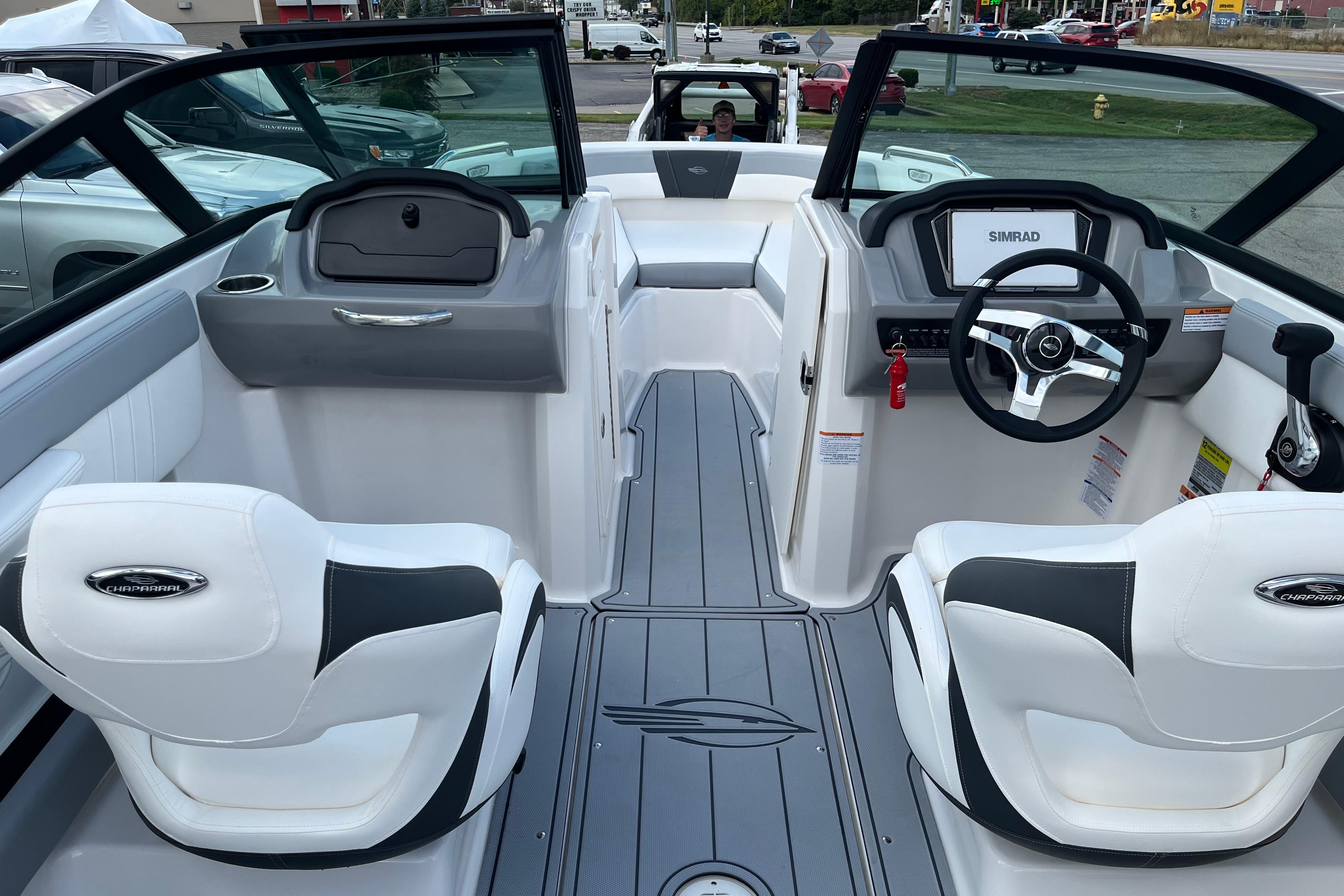 2026 Chaparral 21 SSi boat interior with modern dashboard and seating.