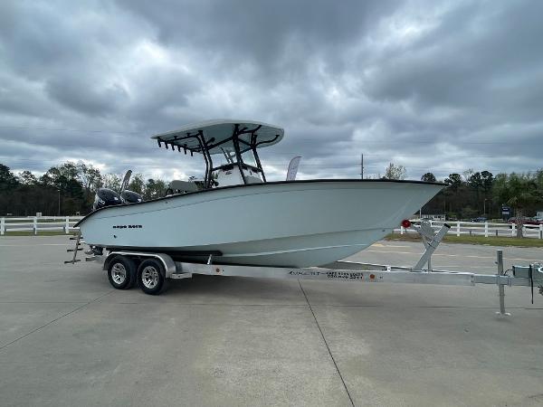 2026 Cape Horn 24XS boat on trailer under cloudy sky.