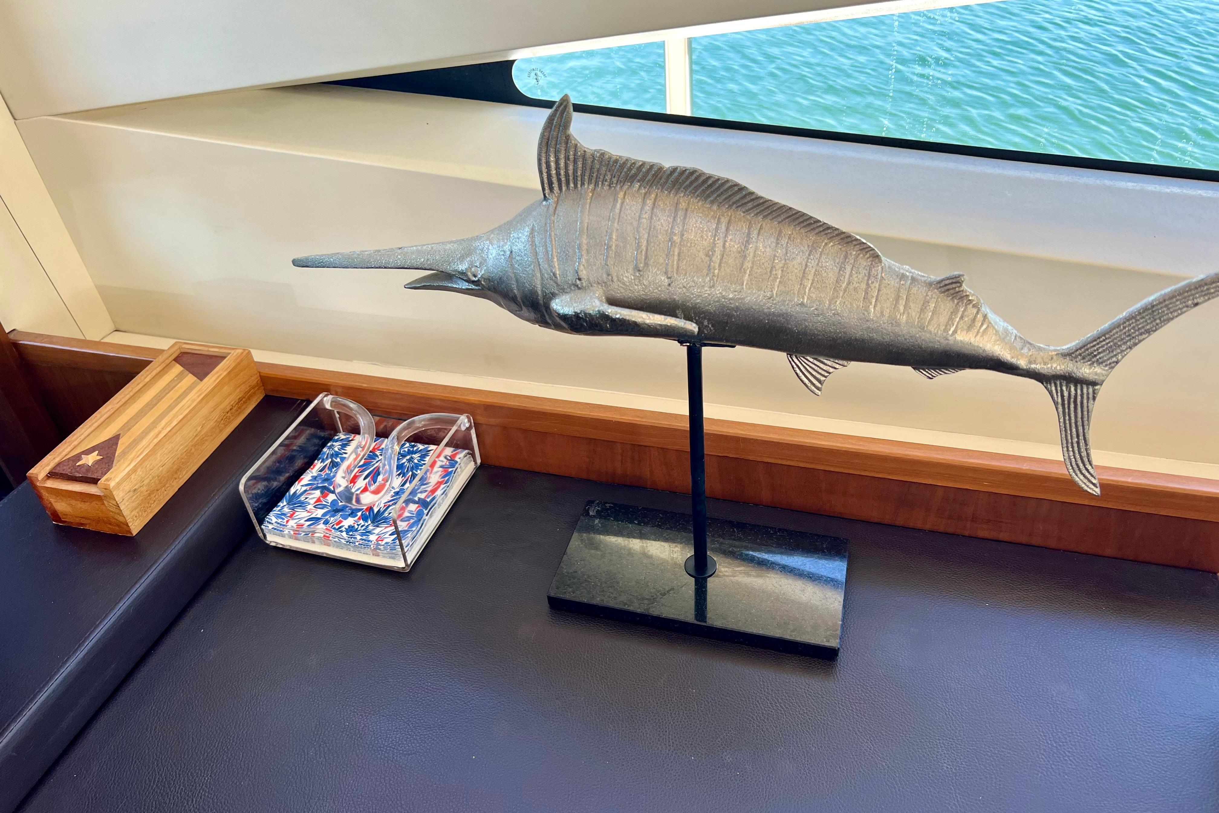 Decorative fish sculpture on Princess V78 yacht interior, 2010 model, with nautical-themed decor.
