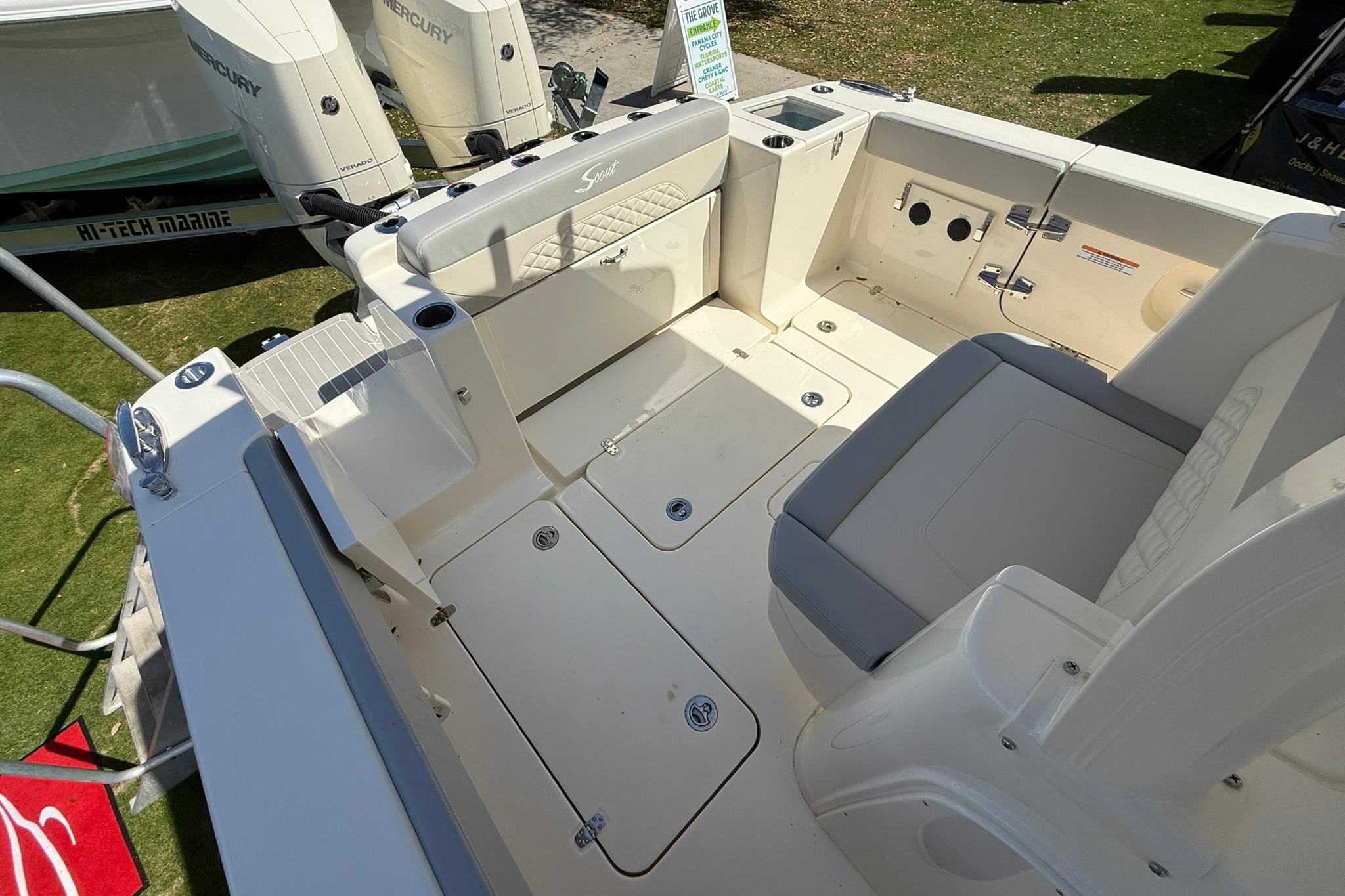 2026 Scout 330 LXF boat interior with seating and storage compartments.