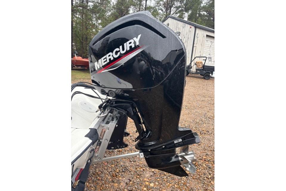 2026 Mako Pro Skiff 17 CC with Mercury outboard motor in outdoor setting.