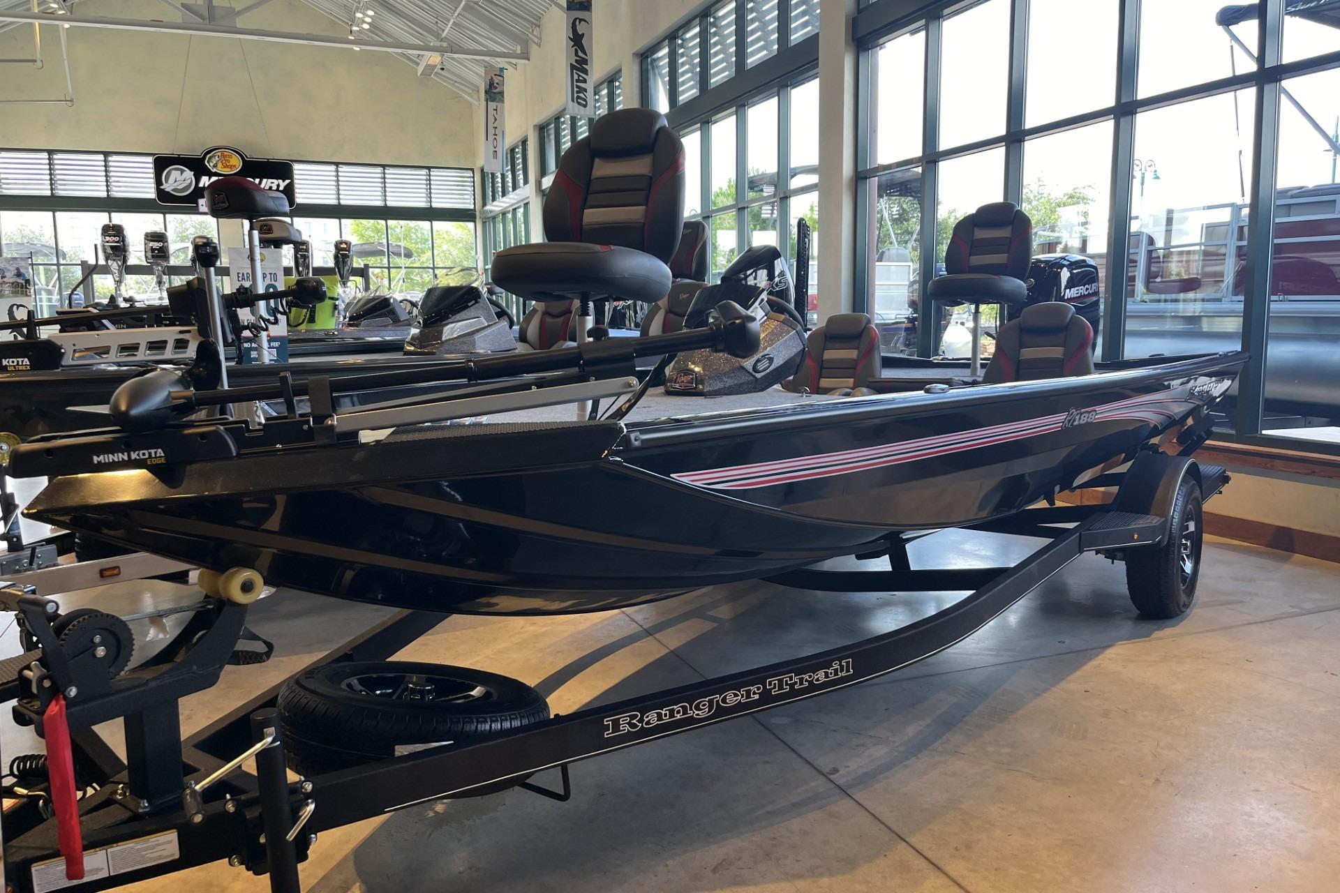 2026 Ranger RT188 boat displayed indoors, featuring sleek design and modern equipment.